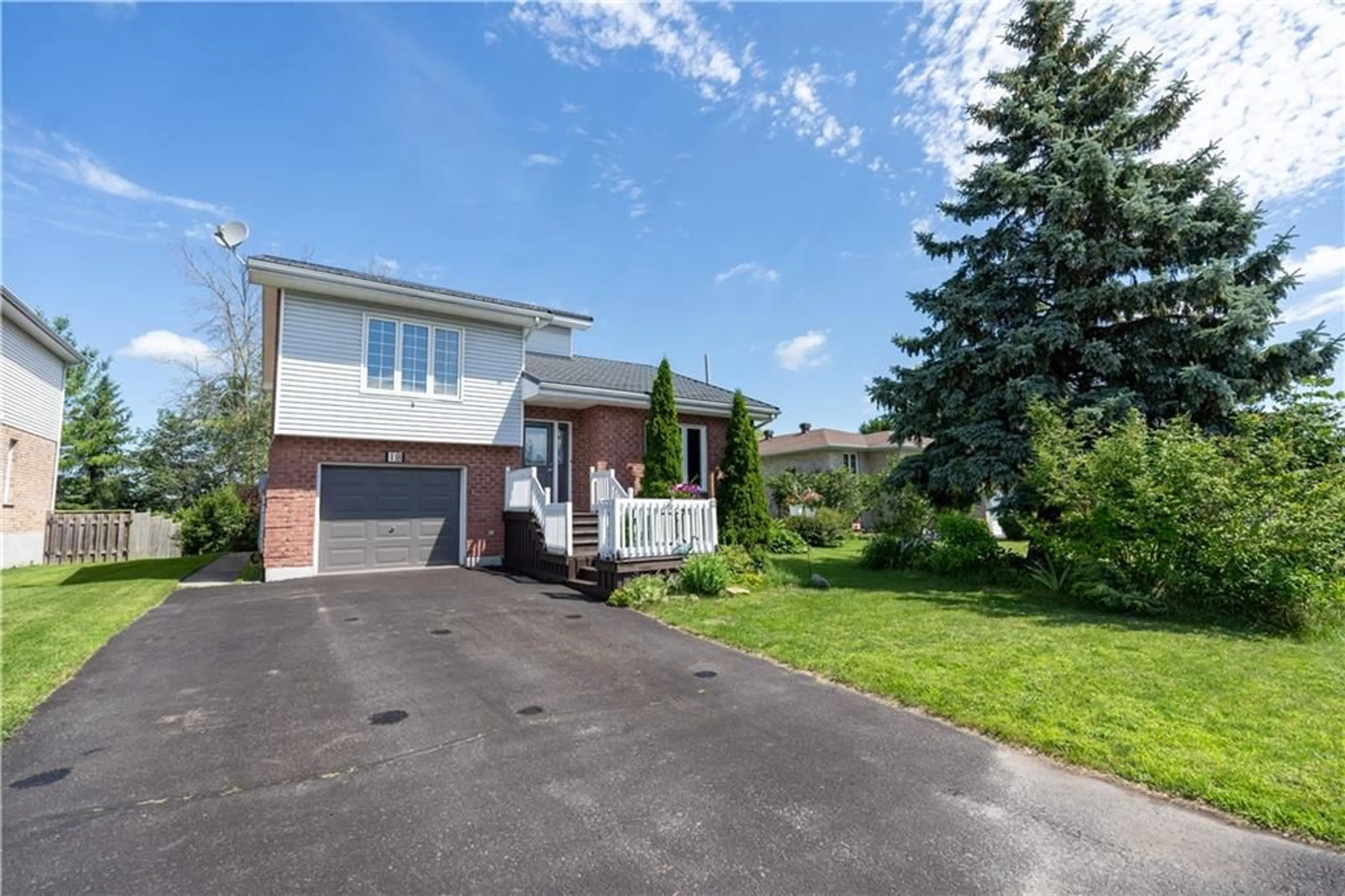 Frontside or backside of a home for 18 CHERRY Ave, Long Sault Ontario K0C 1P0