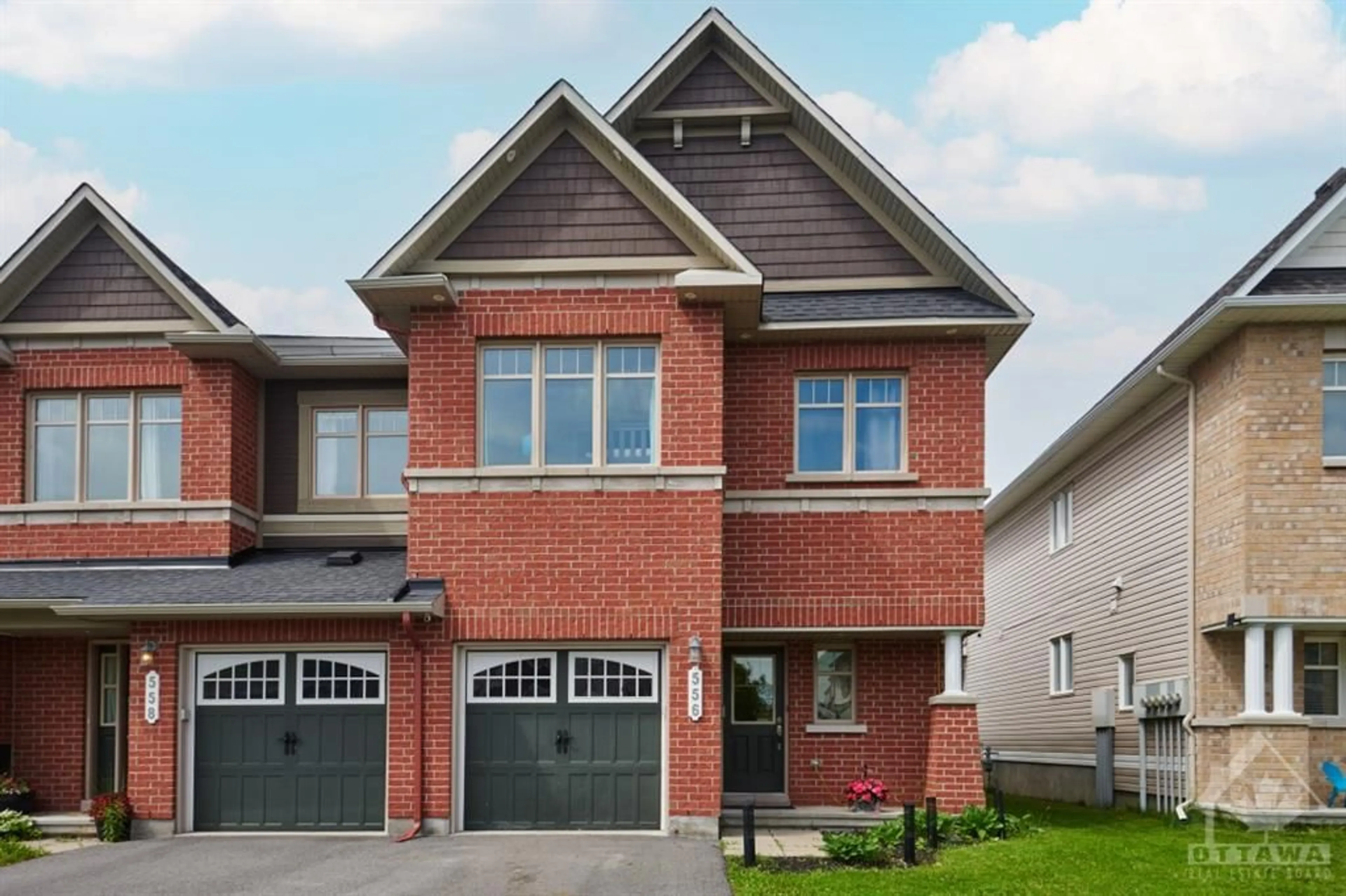 Home with brick exterior material for 556 LANGELIER Ave, Ottawa Ontario K1W 0E7