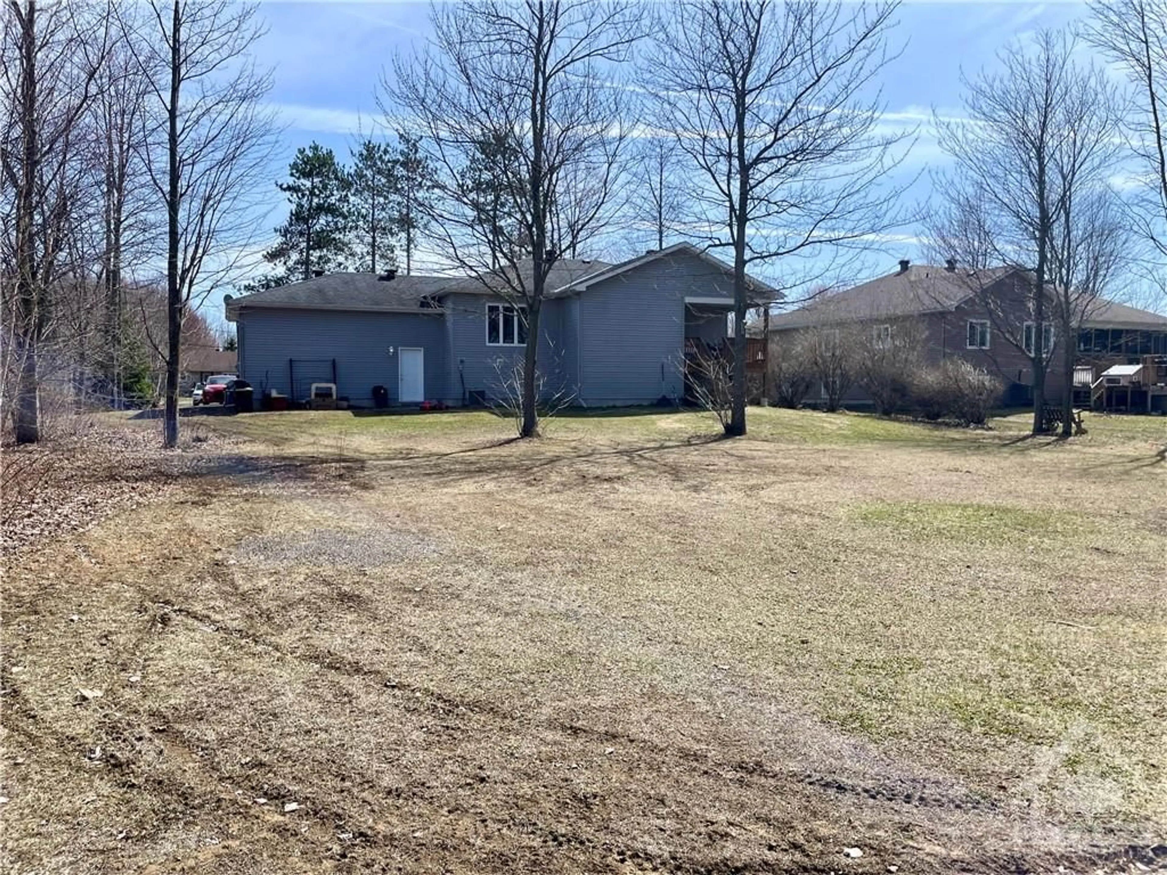 Frontside or backside of a home, the fenced backyard for 1795 KING St, Limoges Ontario K0A 2M0