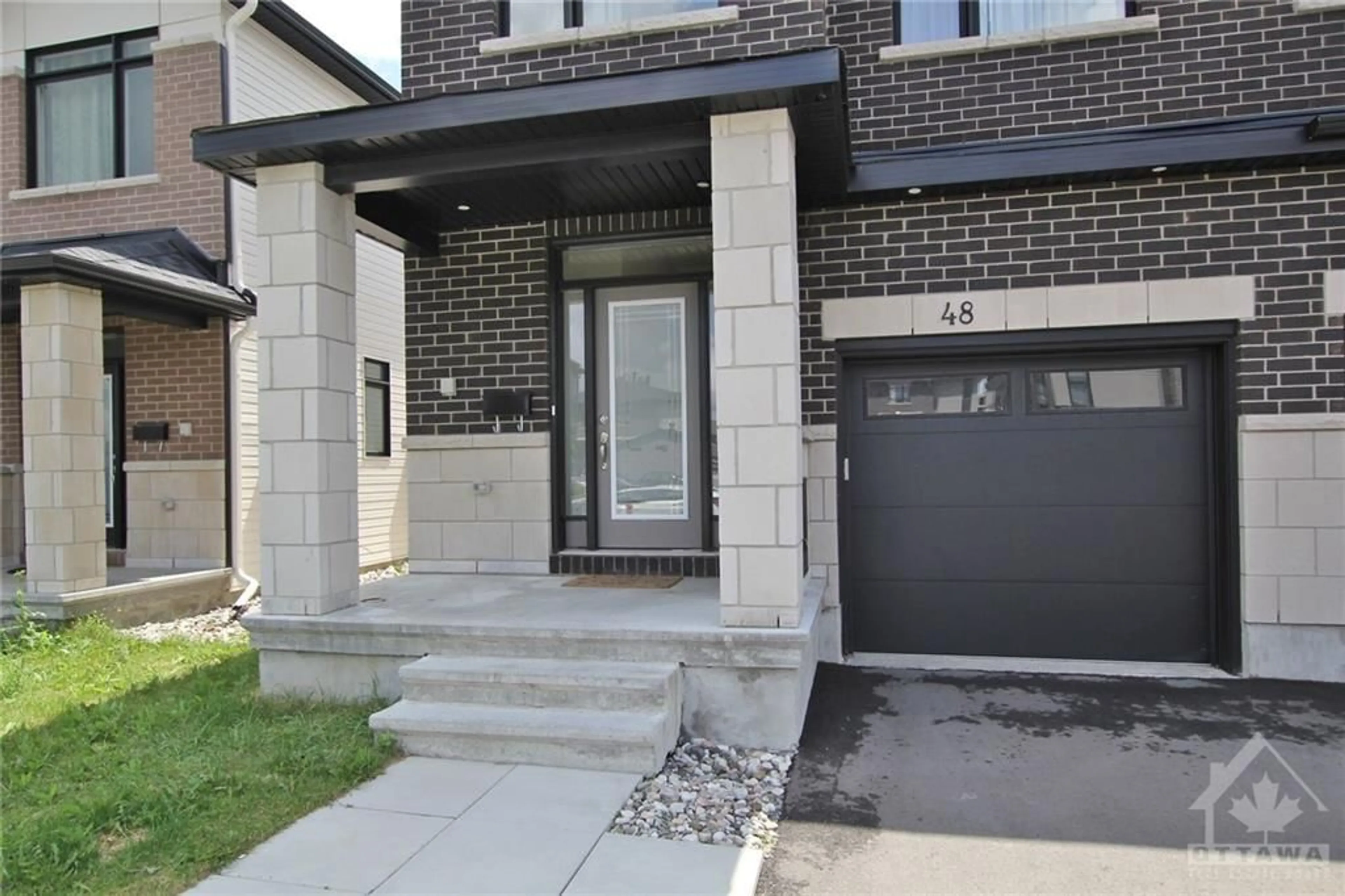 Home with brick exterior material for 48 OVERBERG Way, Ottawa Ontario K2S 2S9