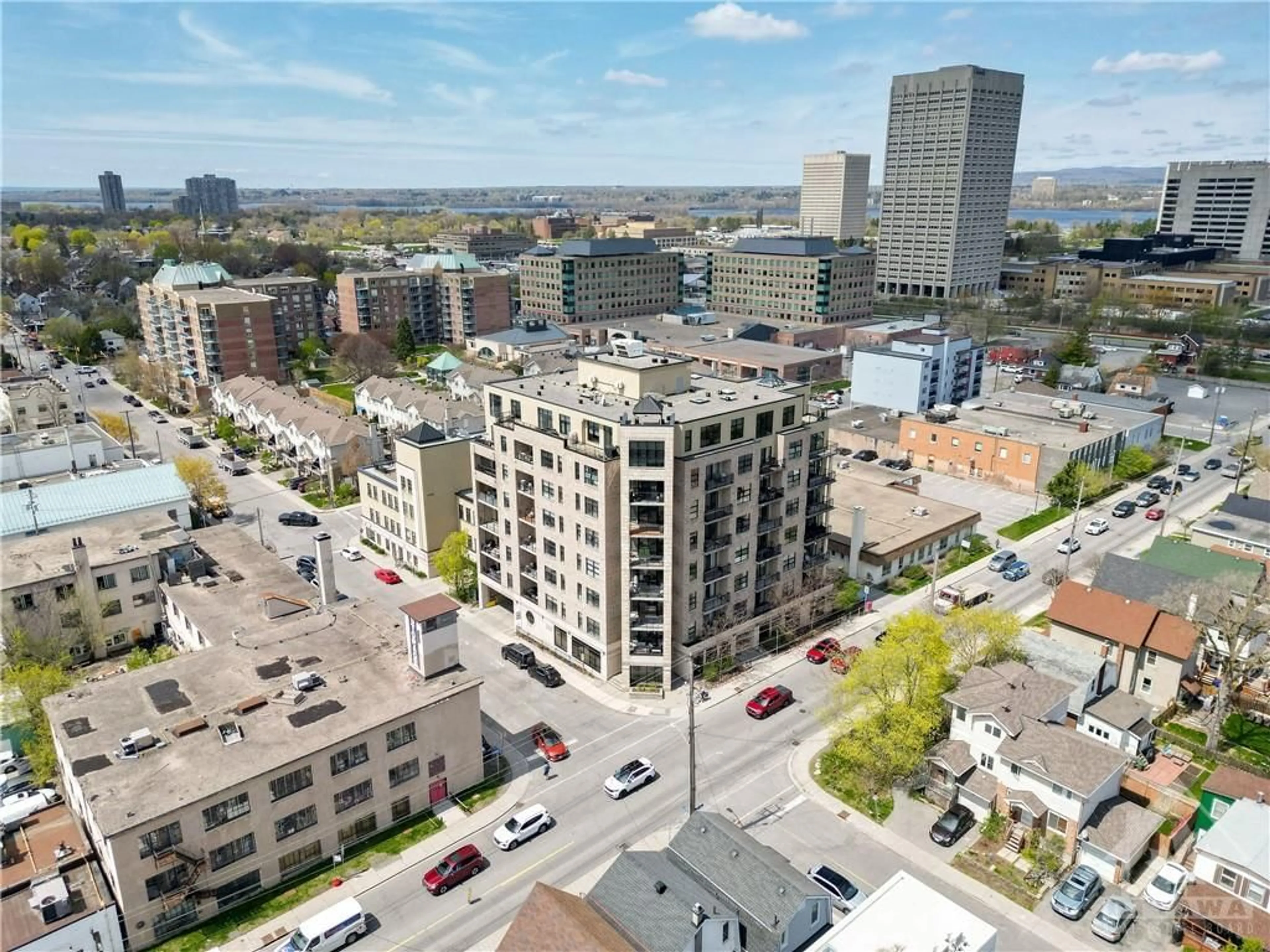 A pic from exterior of the house or condo, the view of city buildings for 45 SPENCER St #203, Ottawa Ontario K1Y 2P5