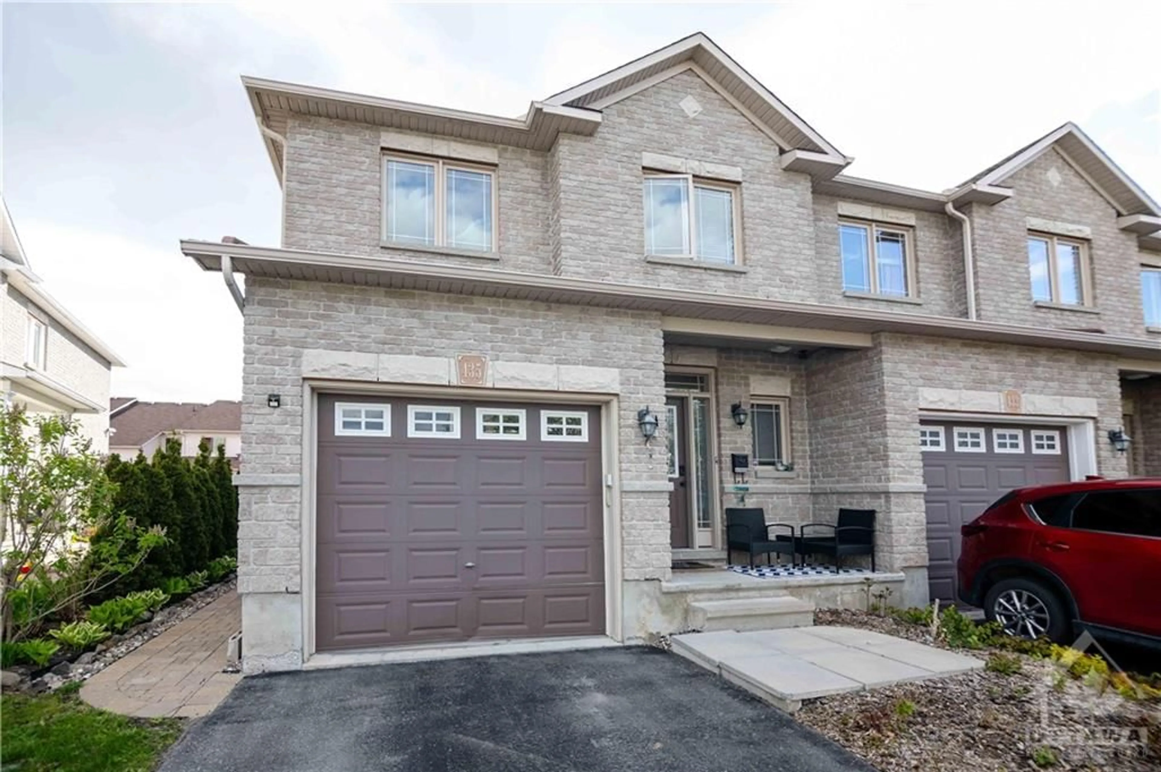 Home with brick exterior material for 435 JUNE Crt, Orleans Ontario K1W 0C9