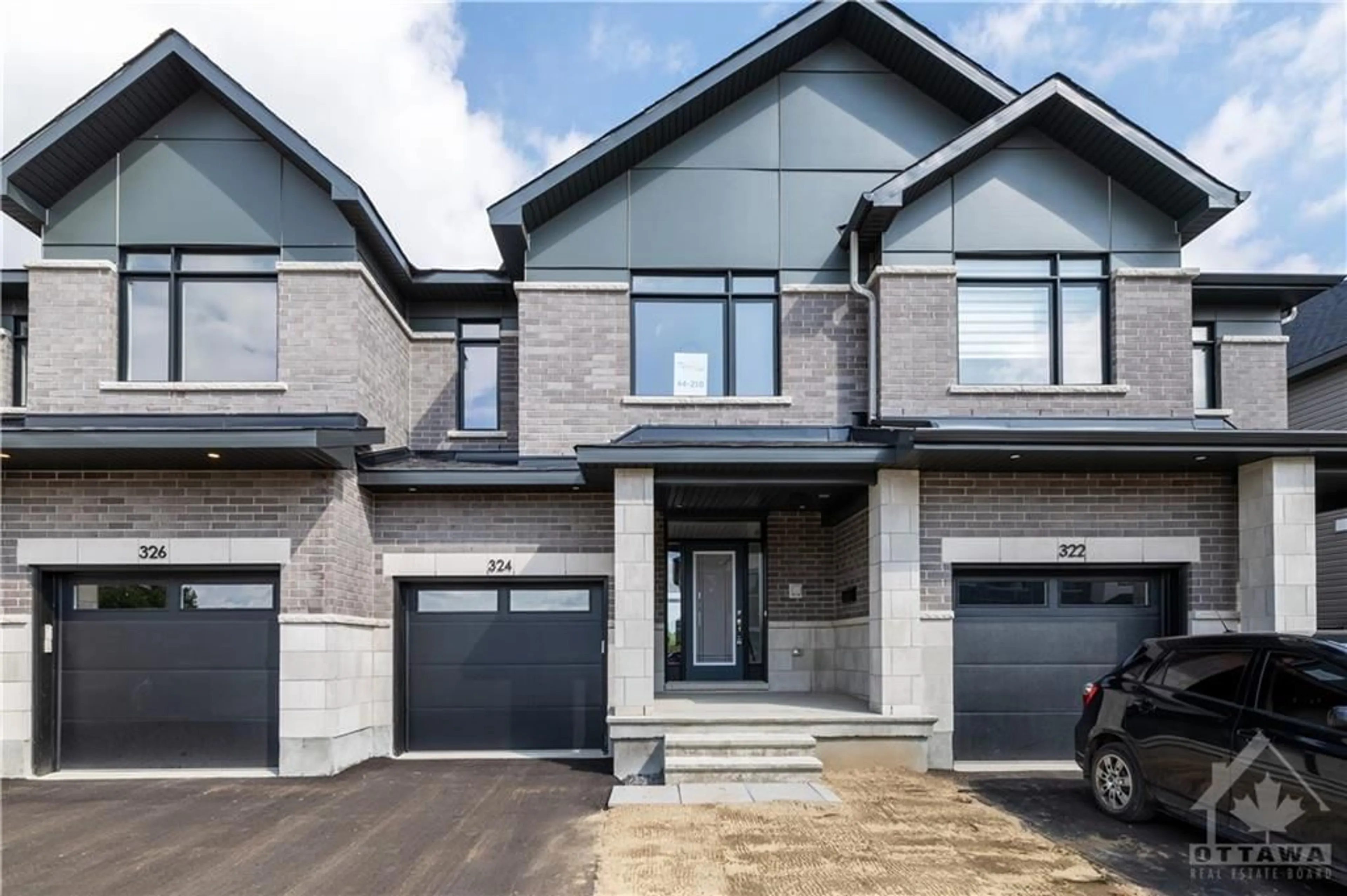 Home with brick exterior material for 324 MAKOBE Lane, Ottawa Ontario K4M 0M1