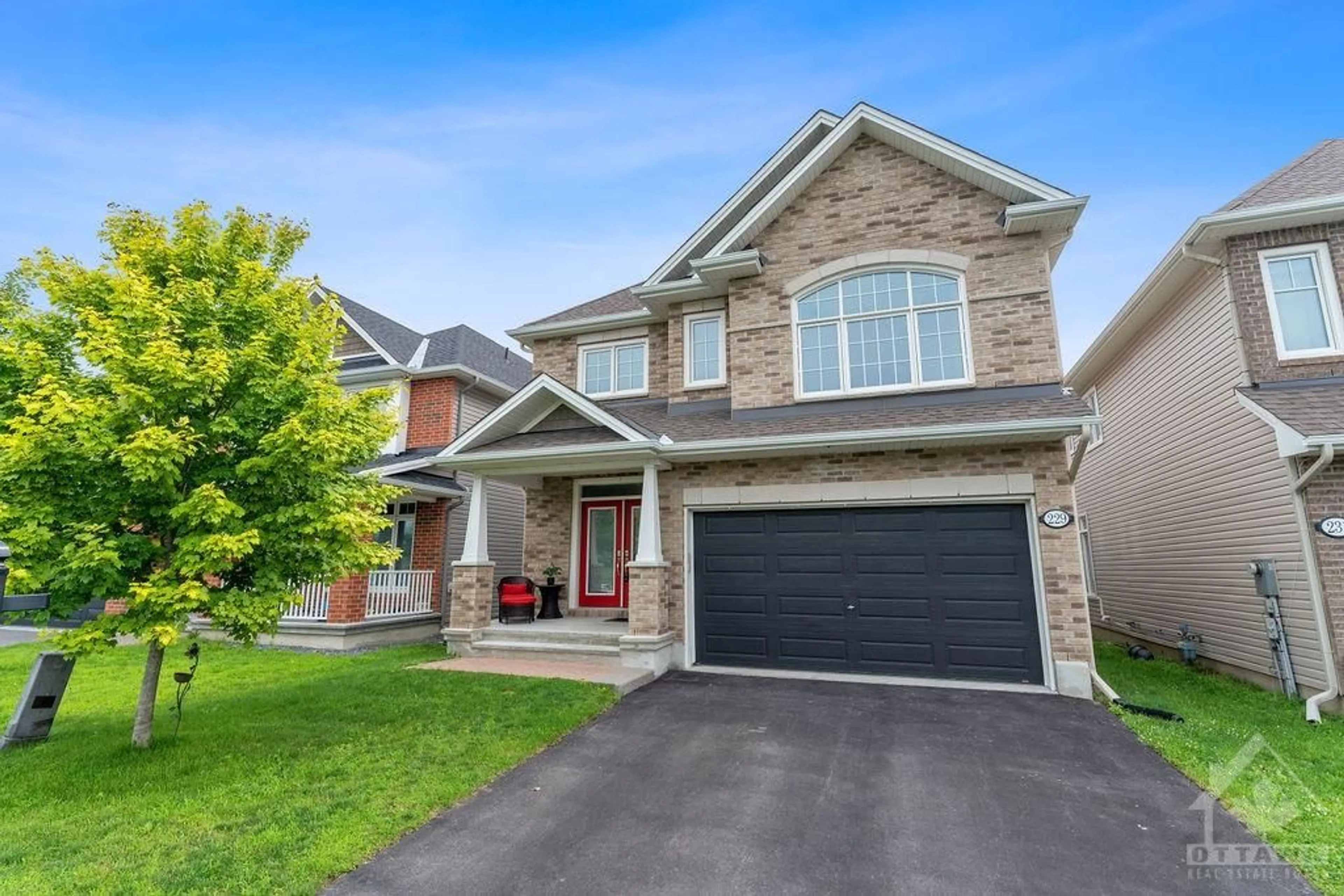 Frontside or backside of a home for 229 MAZON St, Stittsville Ontario K2S 0W5