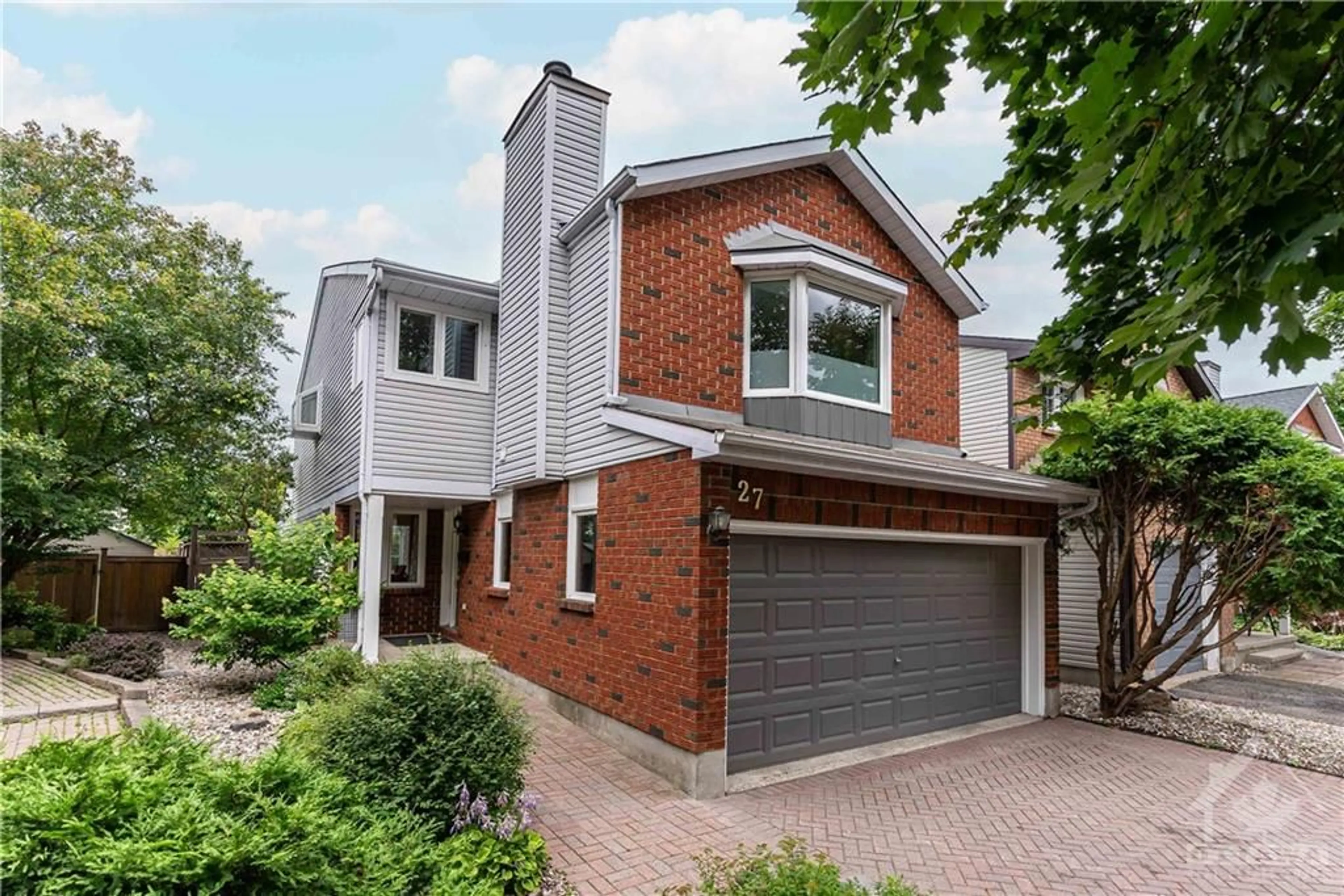 Home with brick exterior material for 27 SADDLE Cres, Ottawa Ontario K1G 5L4