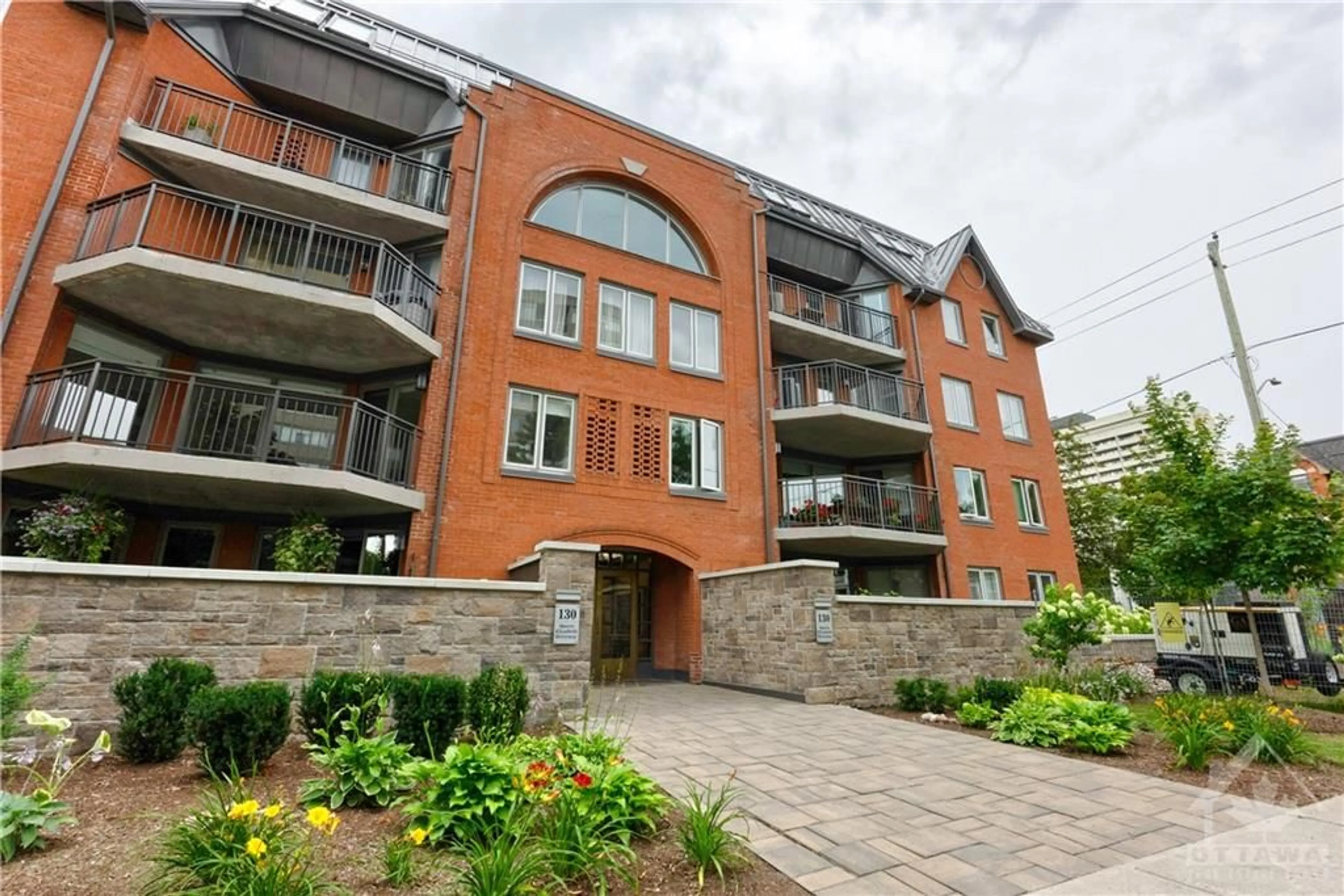 A pic from exterior of the house or condo for 130 QUEEN ELIZABETH Dr #204, Ottawa Ontario K2P 1E6