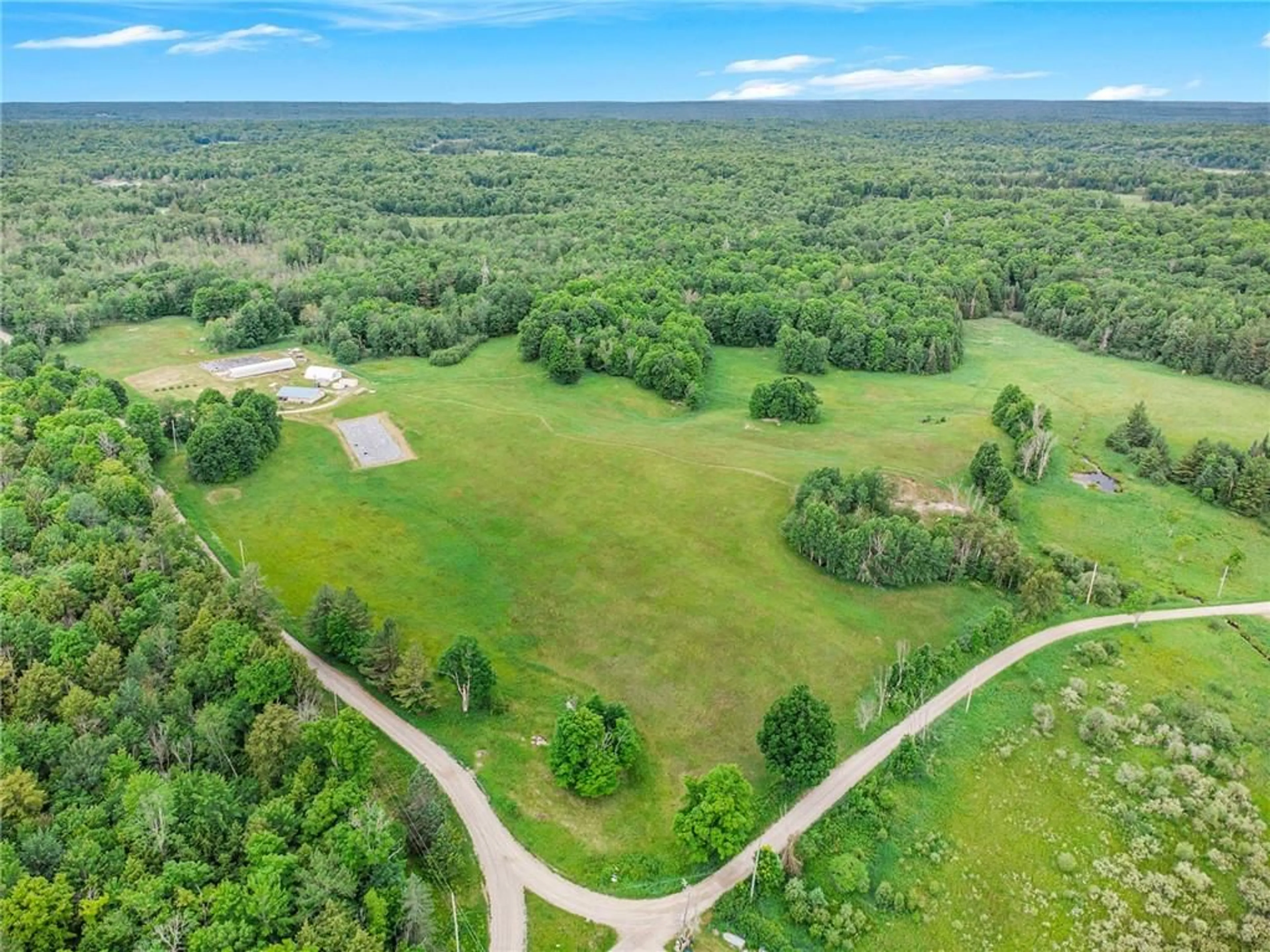 A pic from exterior of the house or condo, the fenced backyard for 1786 CLARENDON Rd, Maberly Ontario K0H 2B0