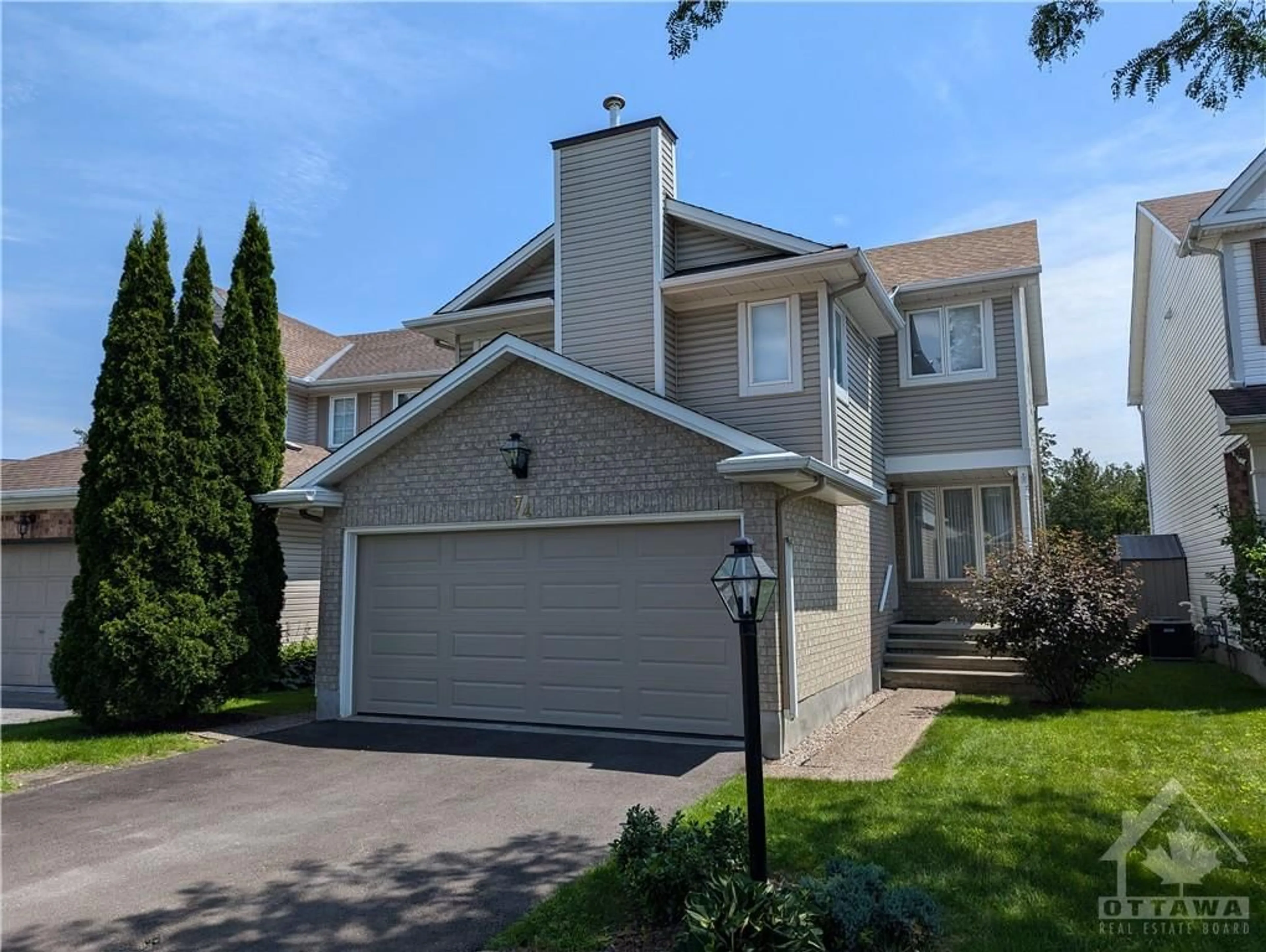 Frontside or backside of a home for 74 MORESBY Dr, Kanata Ontario K2M 2J3