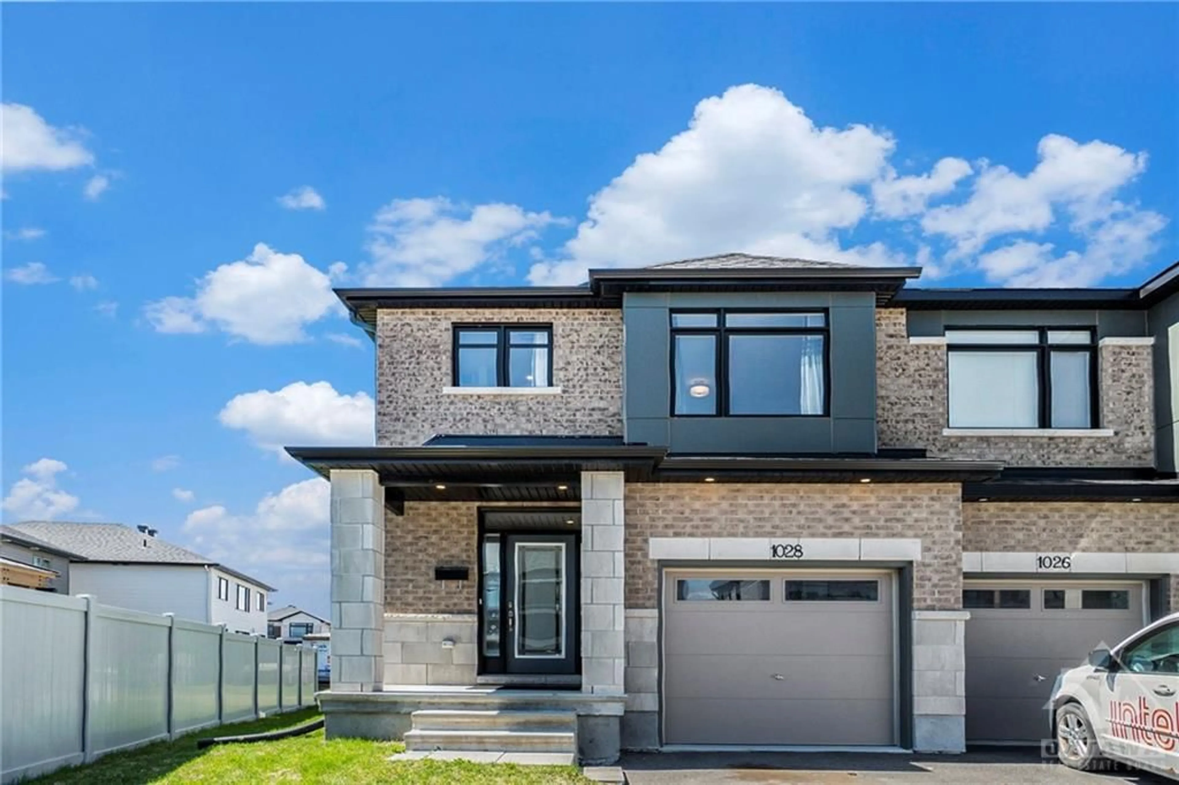 Home with brick exterior material for 1028 HYDRANGEA Ave, Ottawa Ontario K4M 1B2