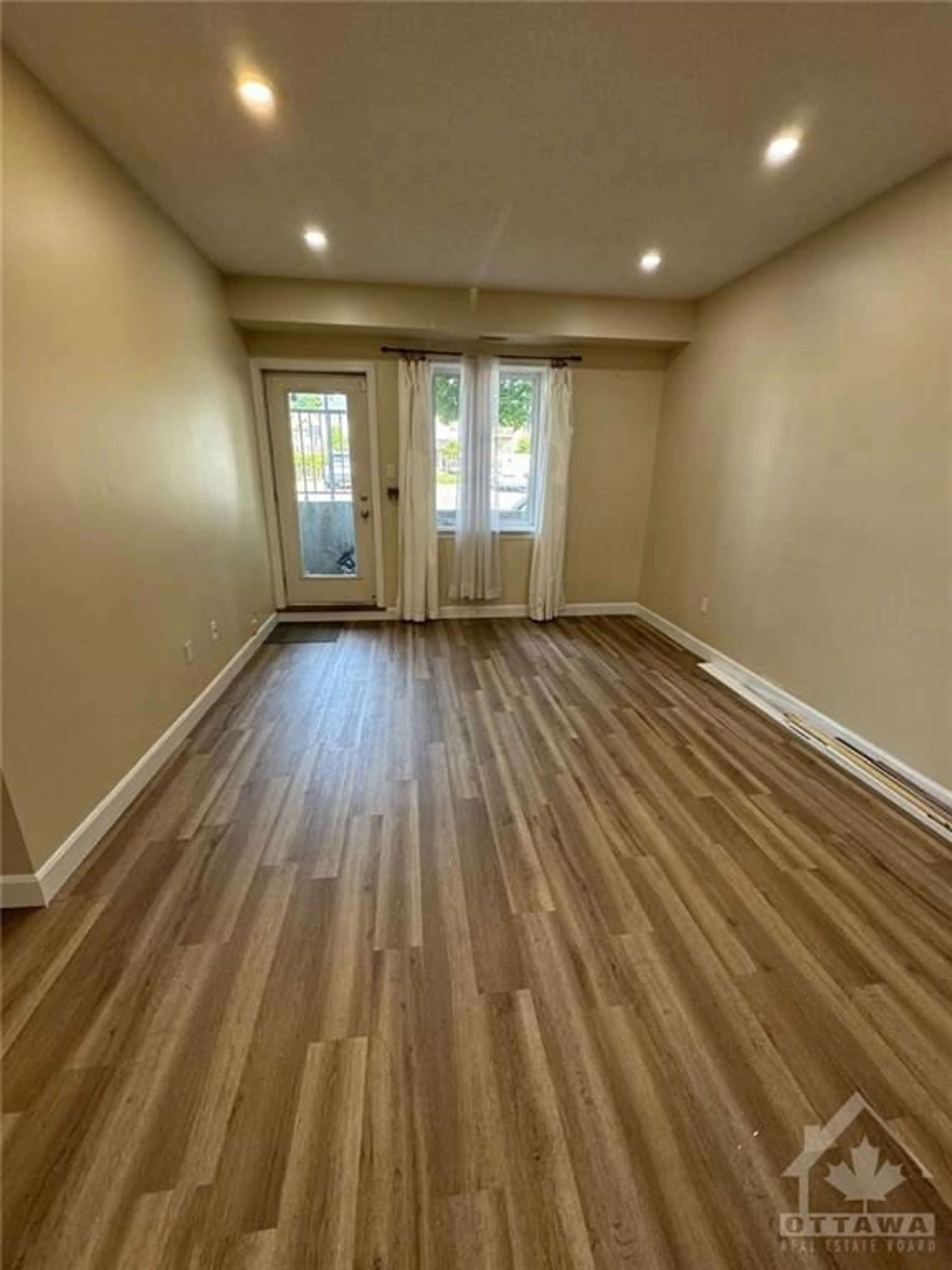 A pic of a room, wood floors for 45 TAYSIDE Pvt #B, Ottawa Ontario K2J 2T3