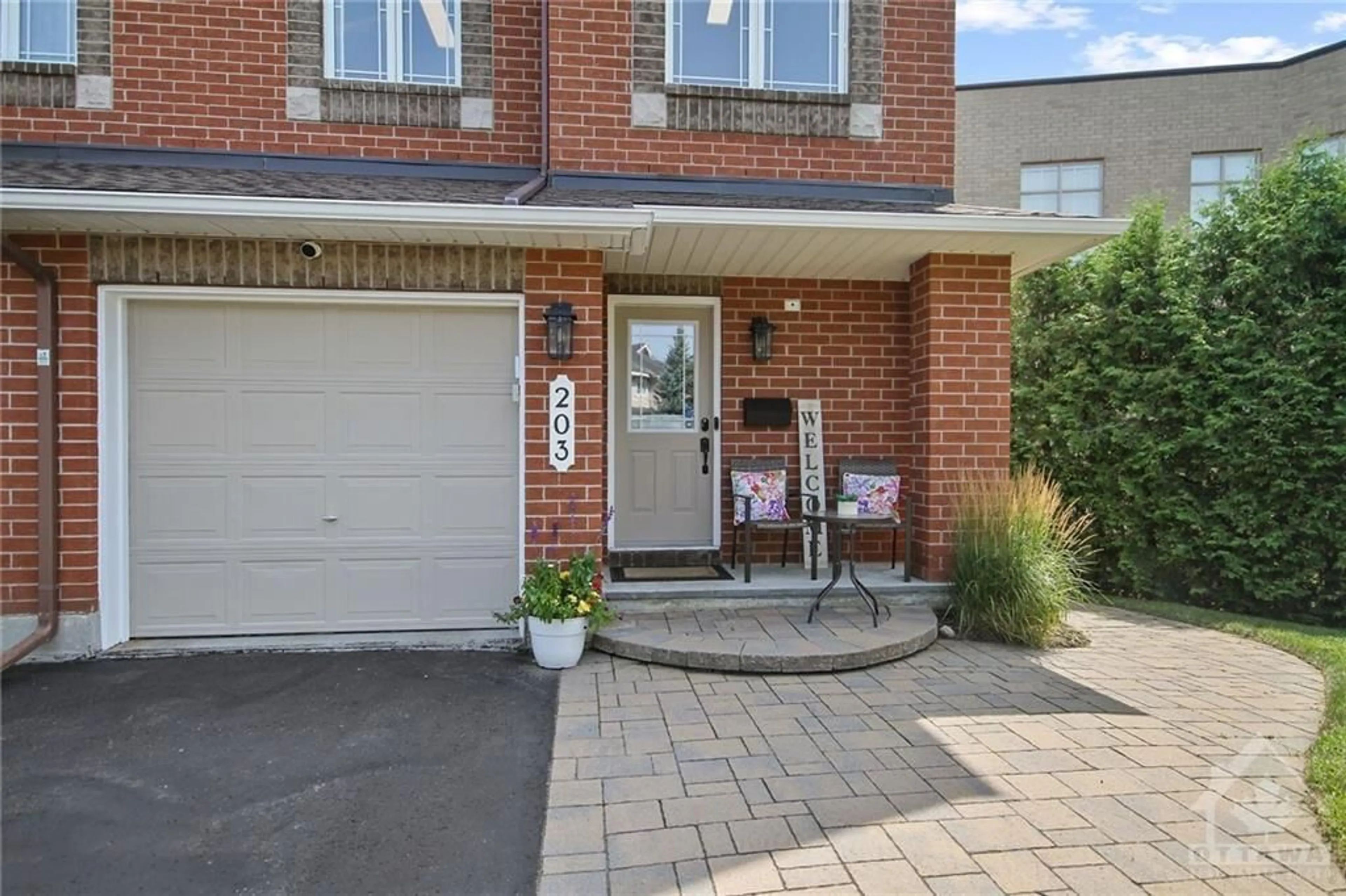 Home with brick exterior material for 203 DEERFOX Dr, Ottawa Ontario K2J 2W8