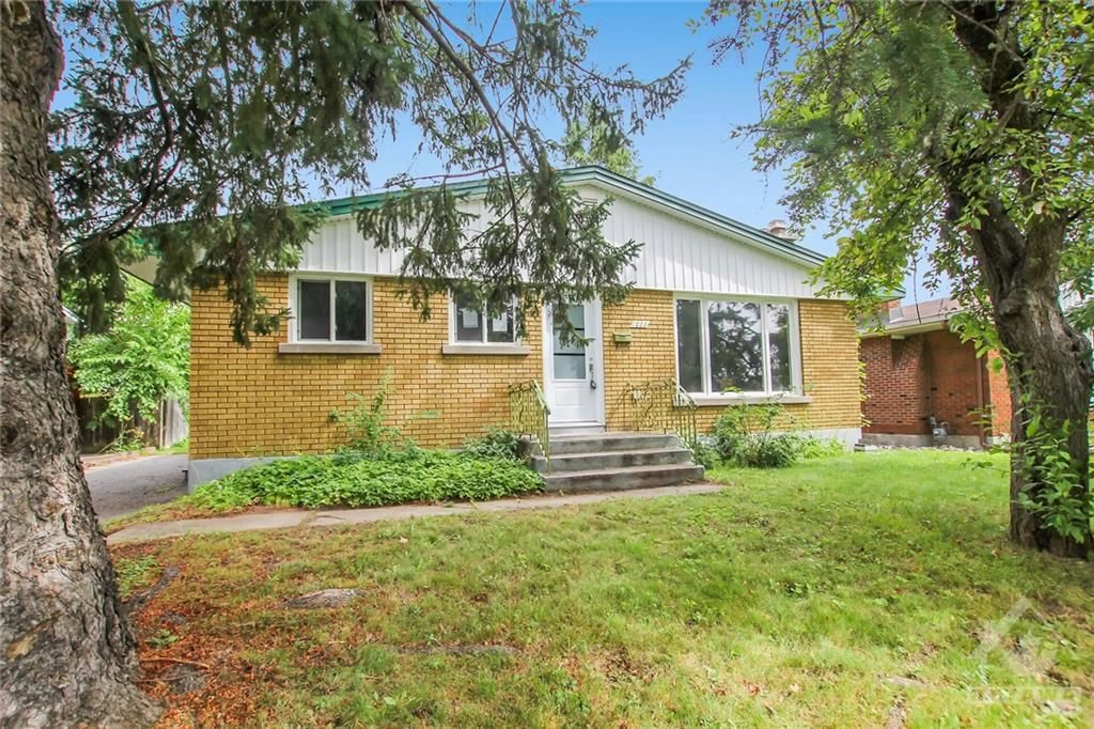 Home with brick exterior material for 1223 WHITMORE Ave, Ottawa Ontario K2C 2N6