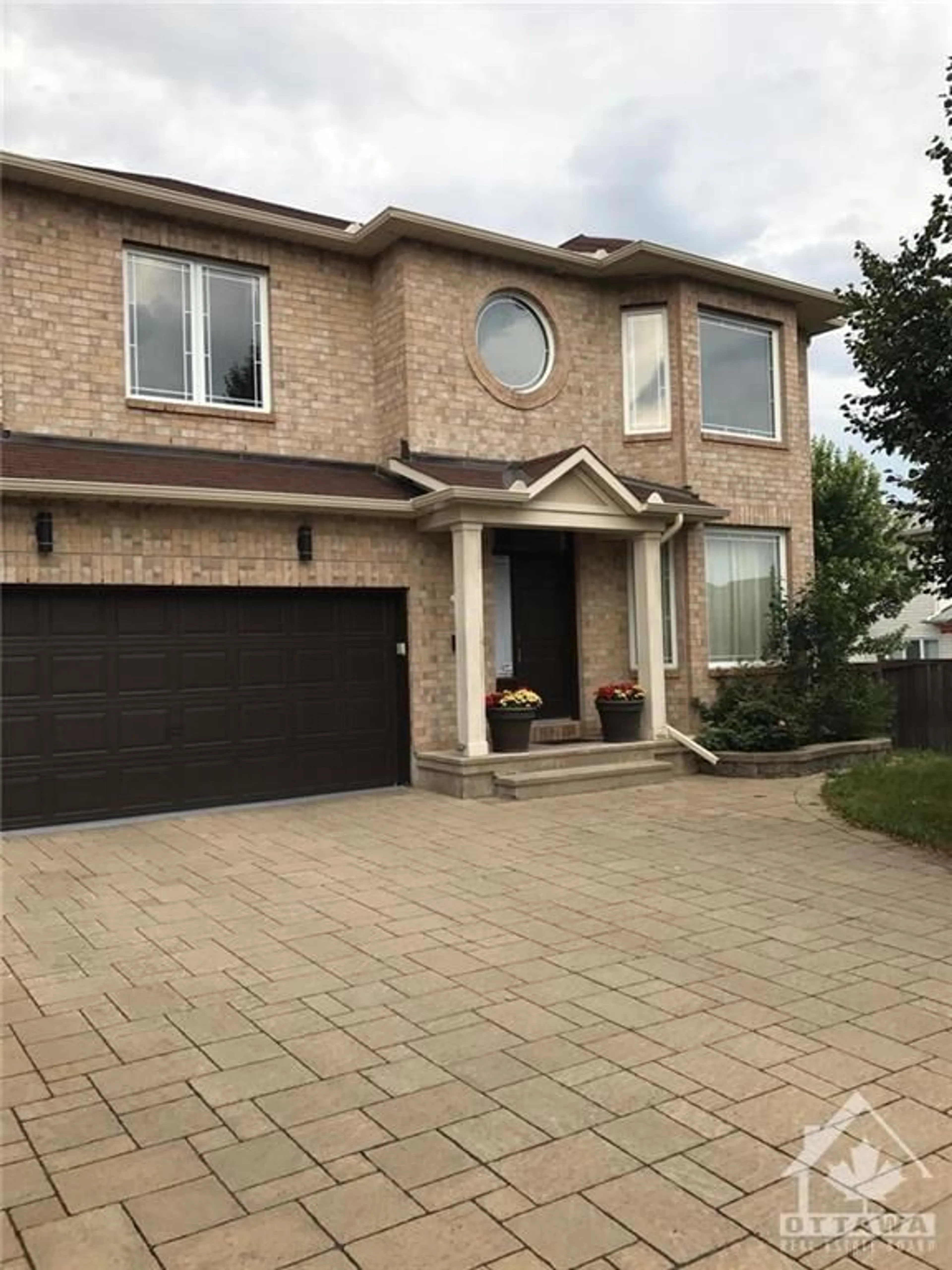 Home with brick exterior material for 129 ROCKY HILL Dr, Ottawa Ontario K2G 7B2