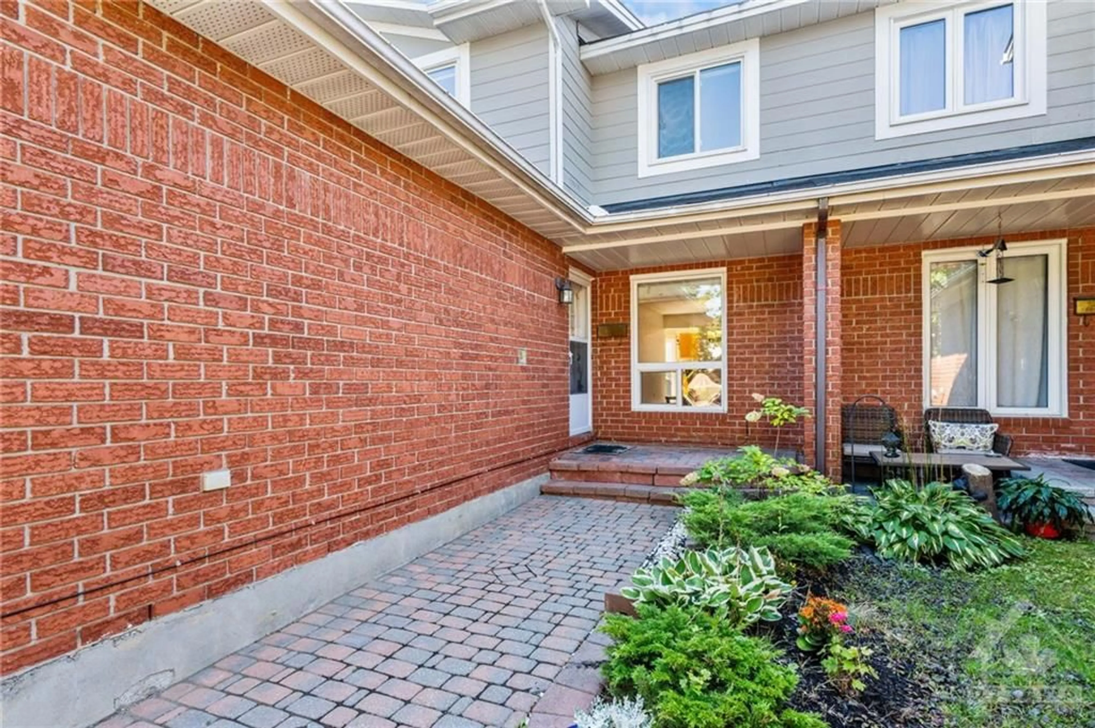 Home with brick exterior material for 153 HUNTERSFIELD Dr, Ottawa Ontario K1T 3M1