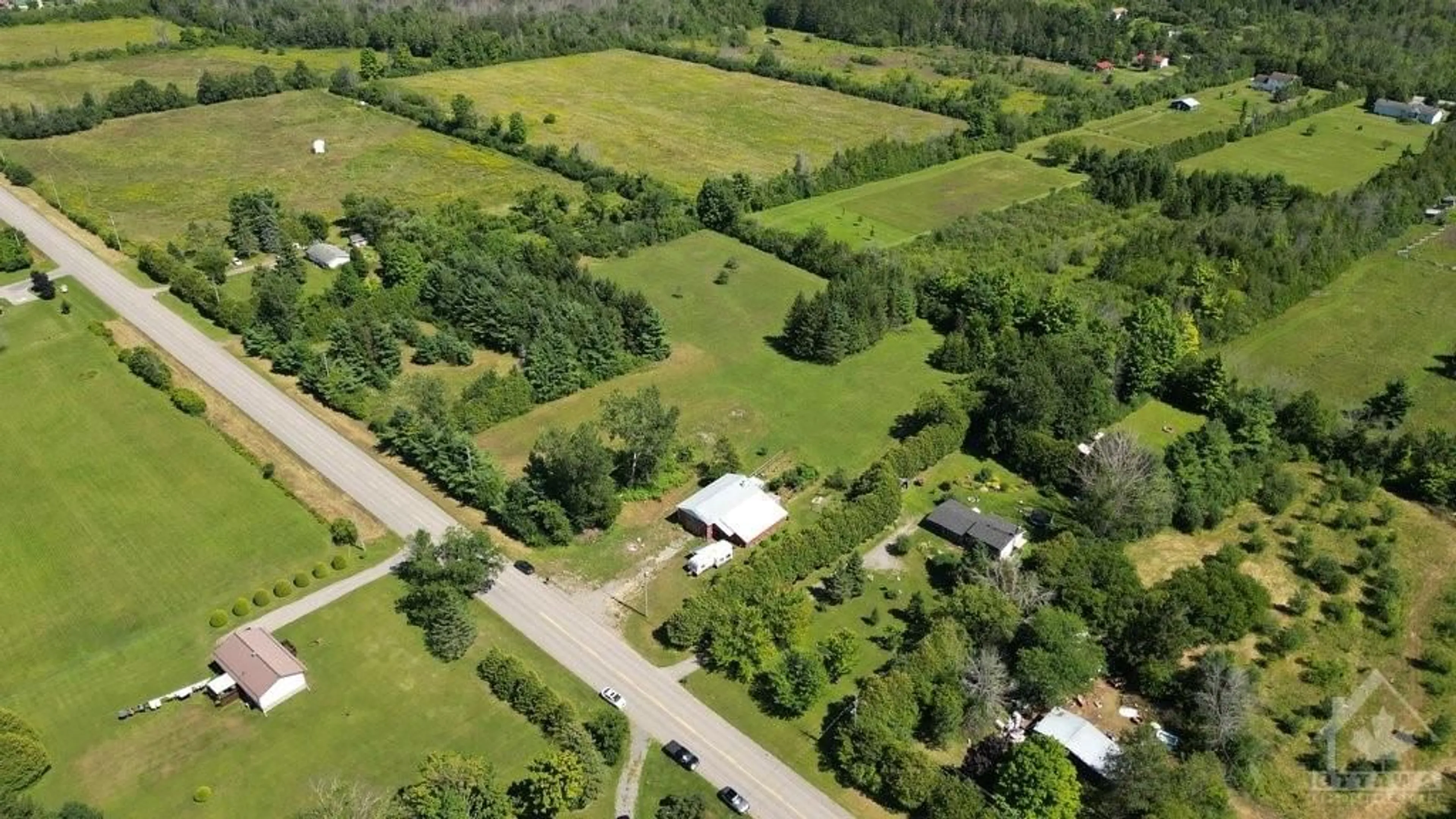 A pic from exterior of the house or condo, the fenced backyard for 1212-1222 COUNTY 18 Rd, Oxford Mills Ontario K0G 1S0