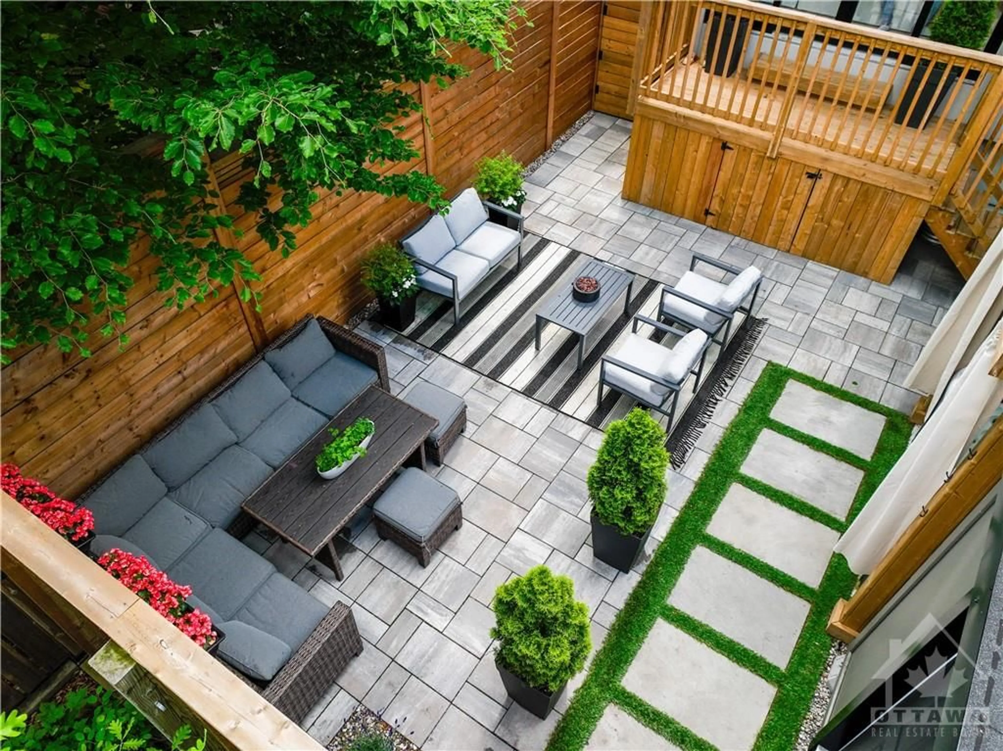 Patio, the fenced backyard for 77A KENORA St, Ottawa Ontario K1Y 3K9