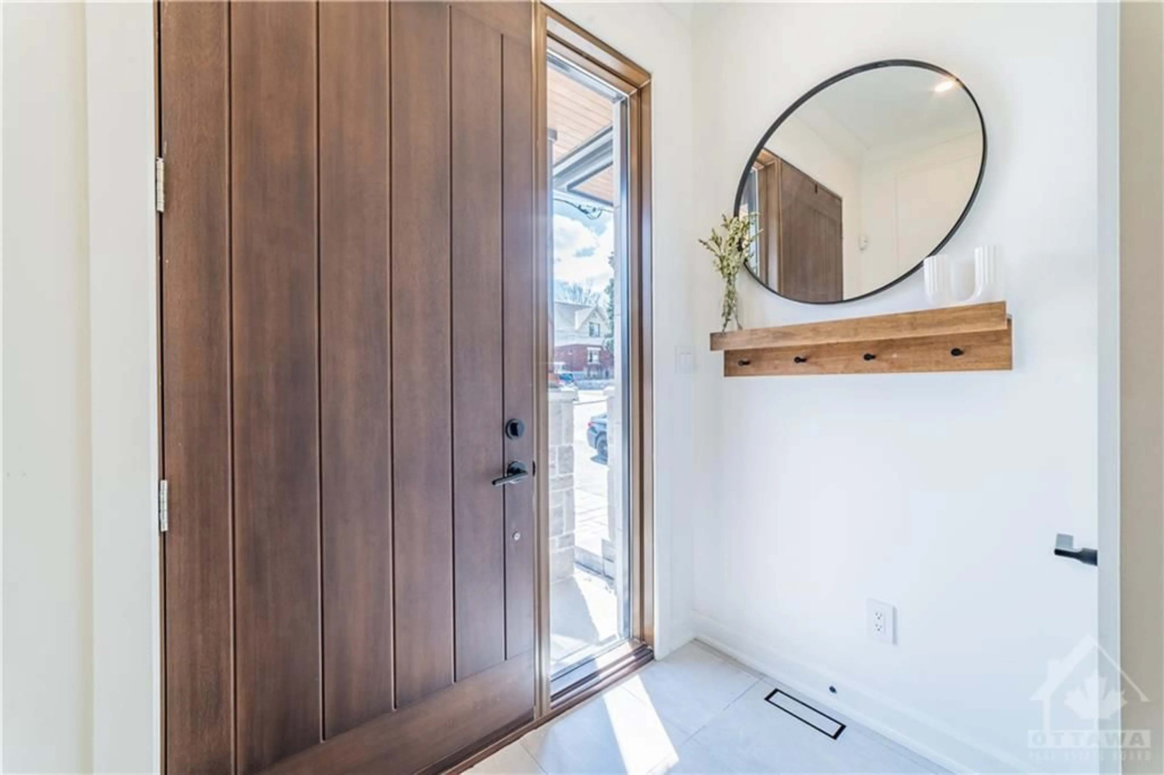 Indoor entryway, wood floors for 77A KENORA St, Ottawa Ontario K1Y 3K9