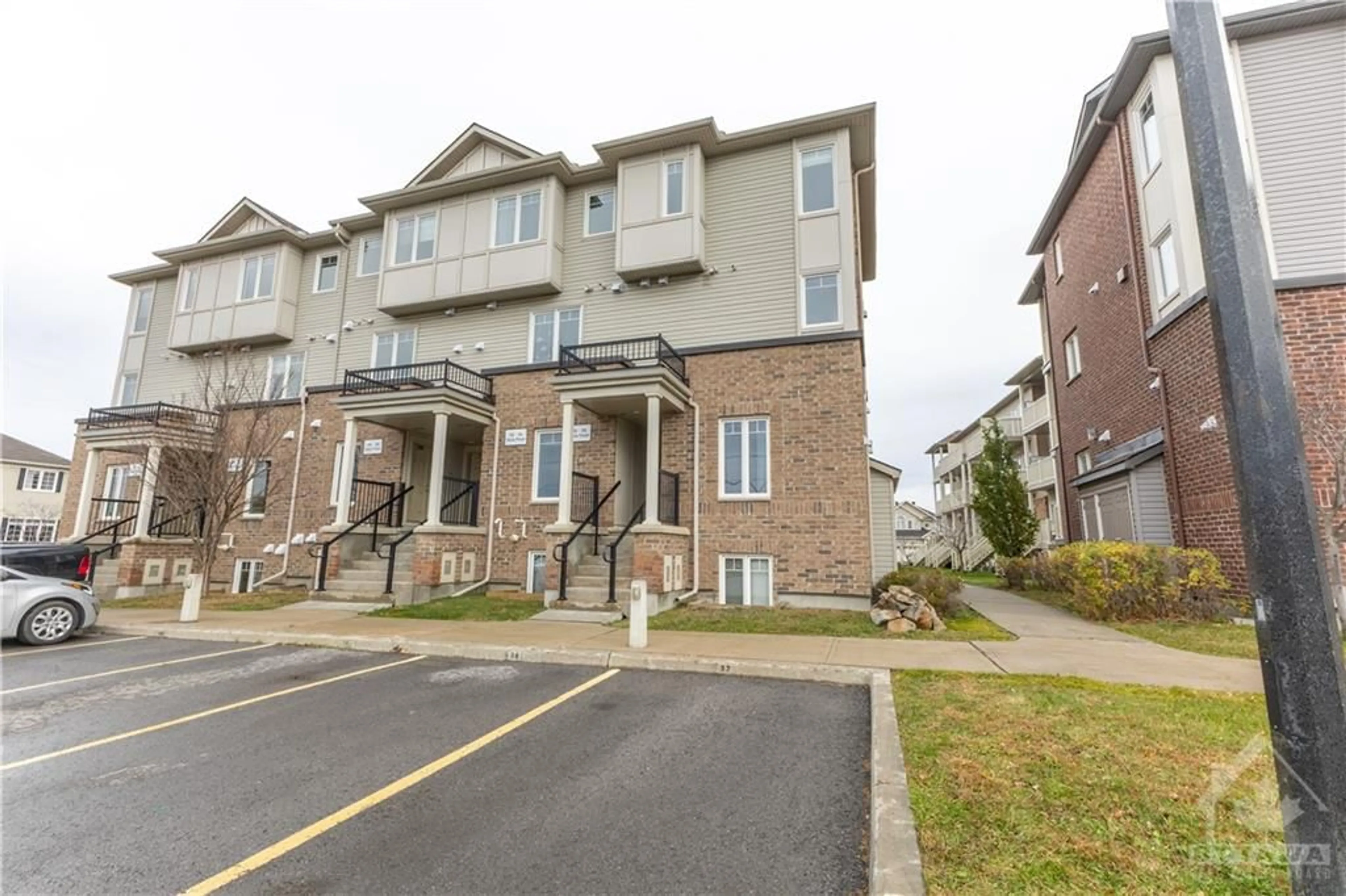 A pic from exterior of the house or condo, the street view for 218 SHANLY Pvt, Nepean Ontario K2J 5X6