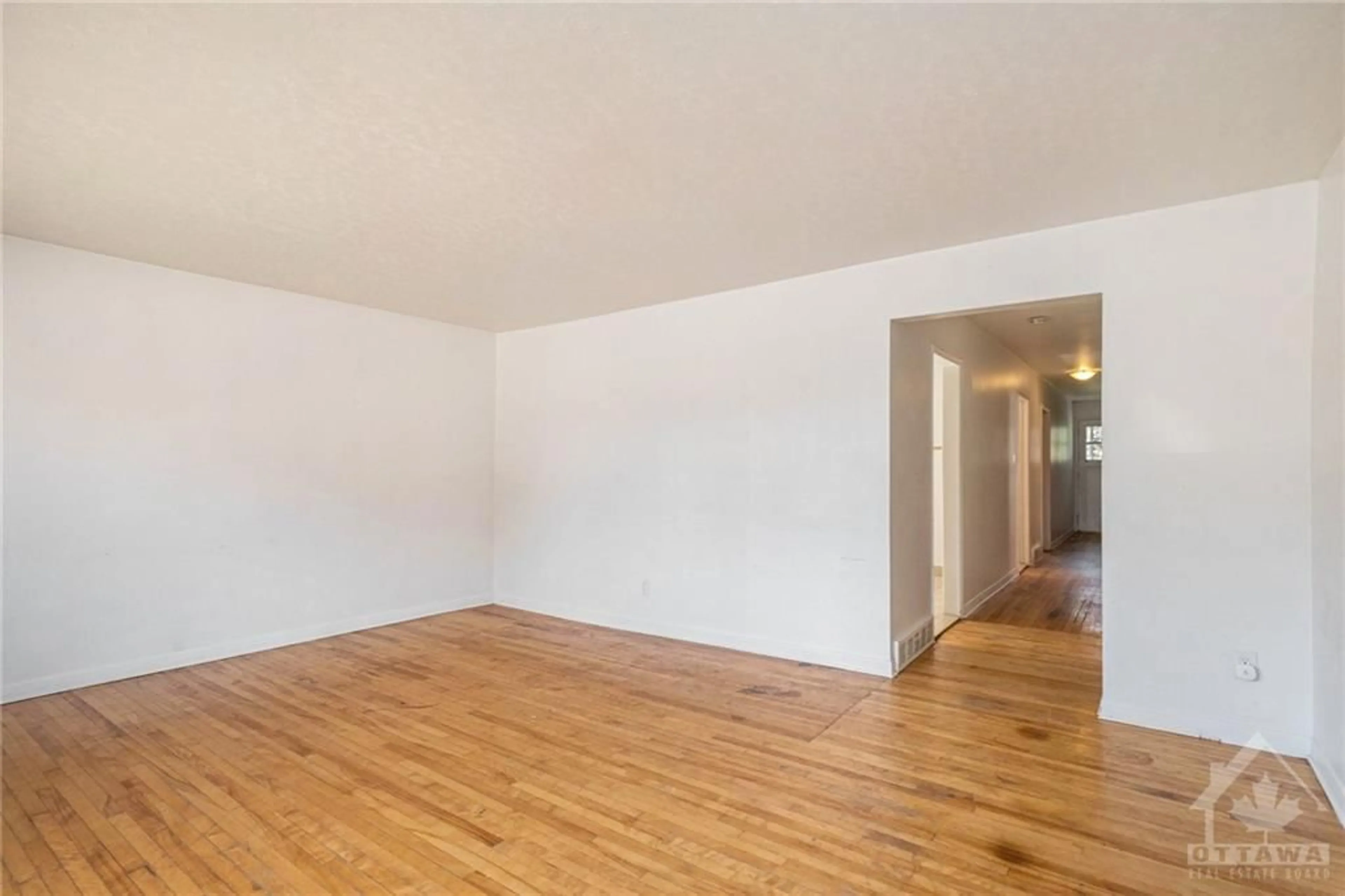 A pic of a room, wood floors for 910 WATSON St, Ottawa Ontario K2B 6B9