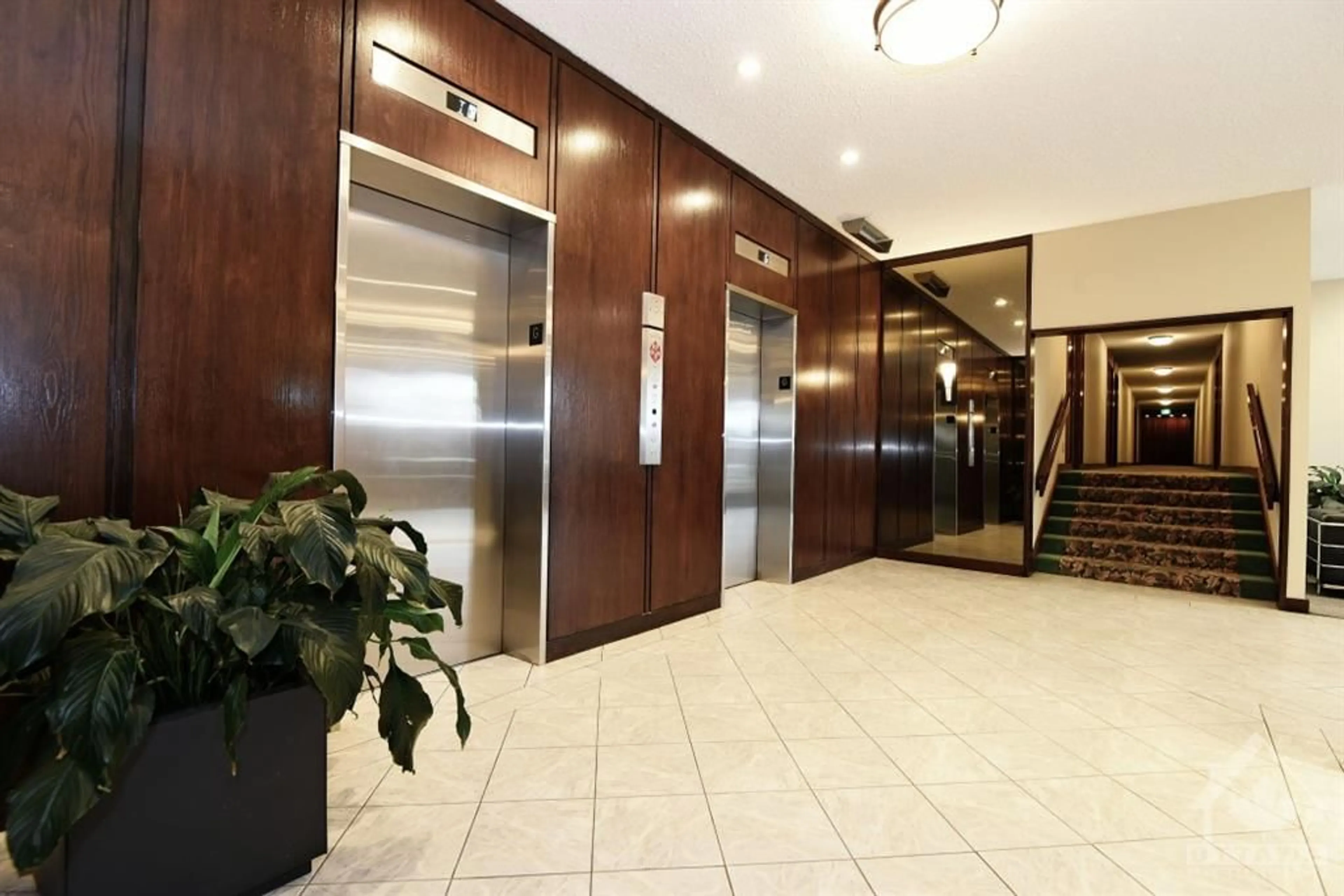 Indoor lobby, wood floors for 2951 RIVERSIDE Dr #102, Ottawa Ontario K1V 8W6