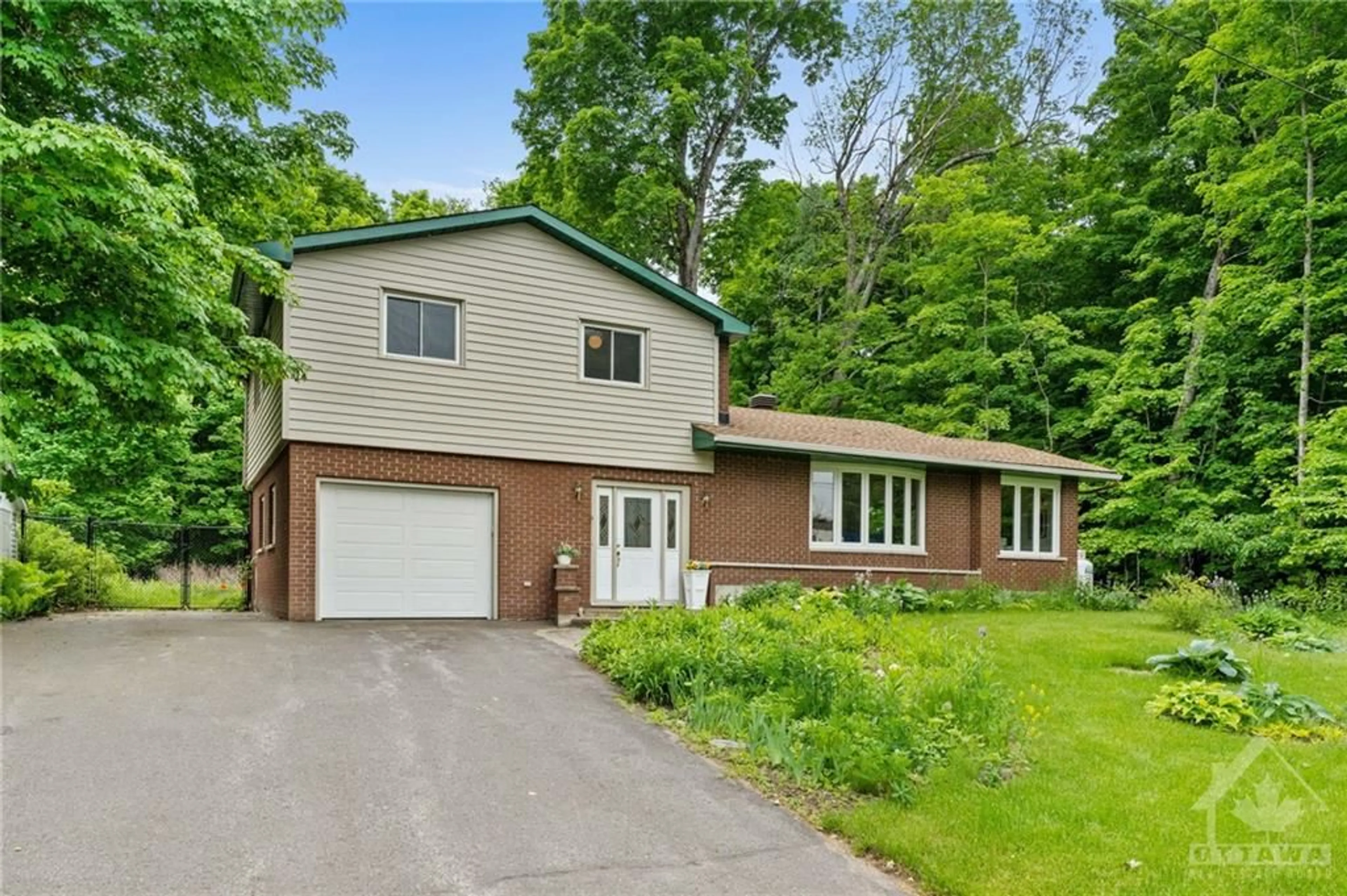 Frontside or backside of a home, cottage for 351 RIVERWOOD Dr, Ottawa Ontario K0A 3M0