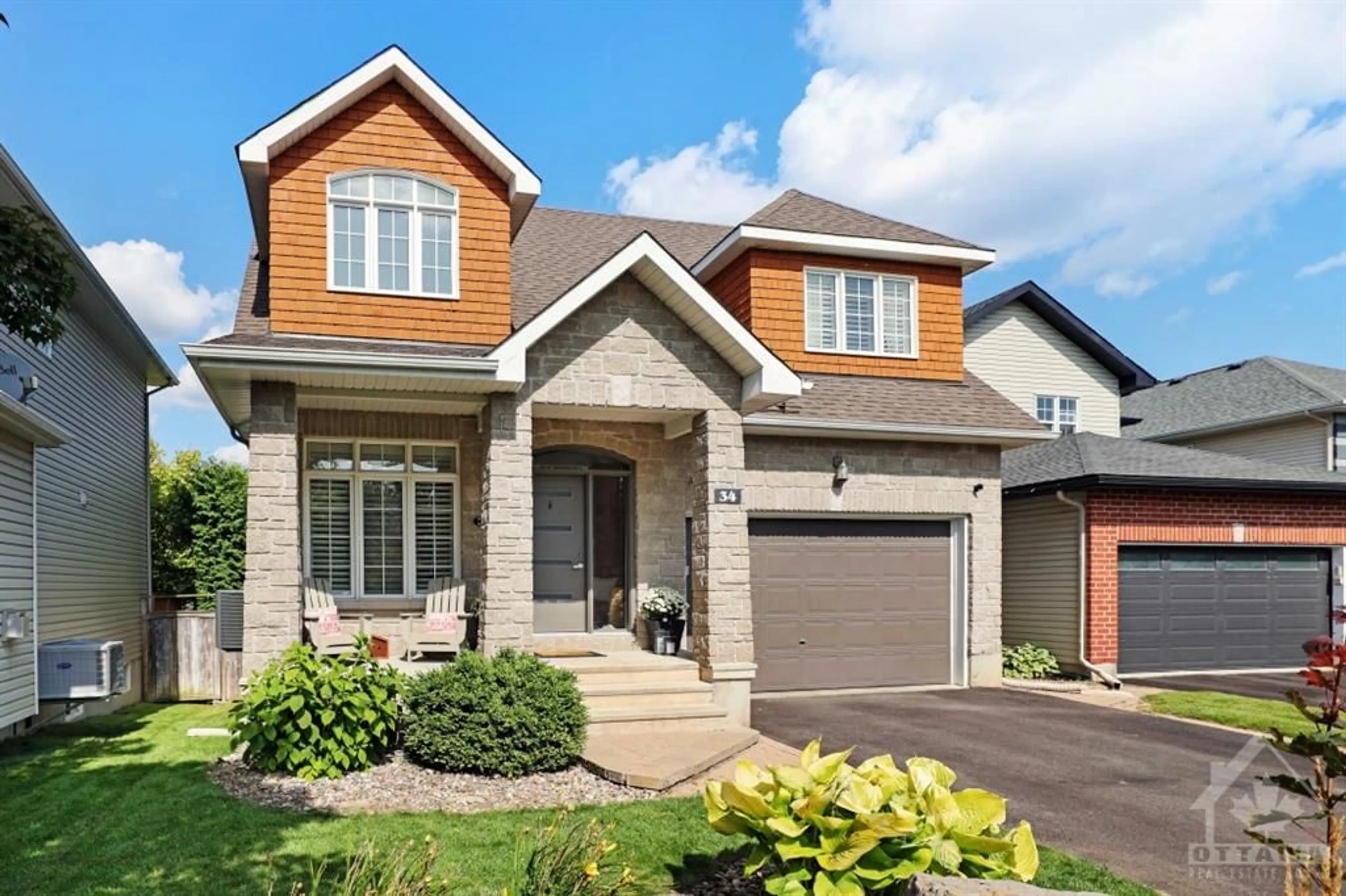 Home with brick exterior material for 34 BLACKBIRD Lane, Stittsville Ontario K2S 2C9