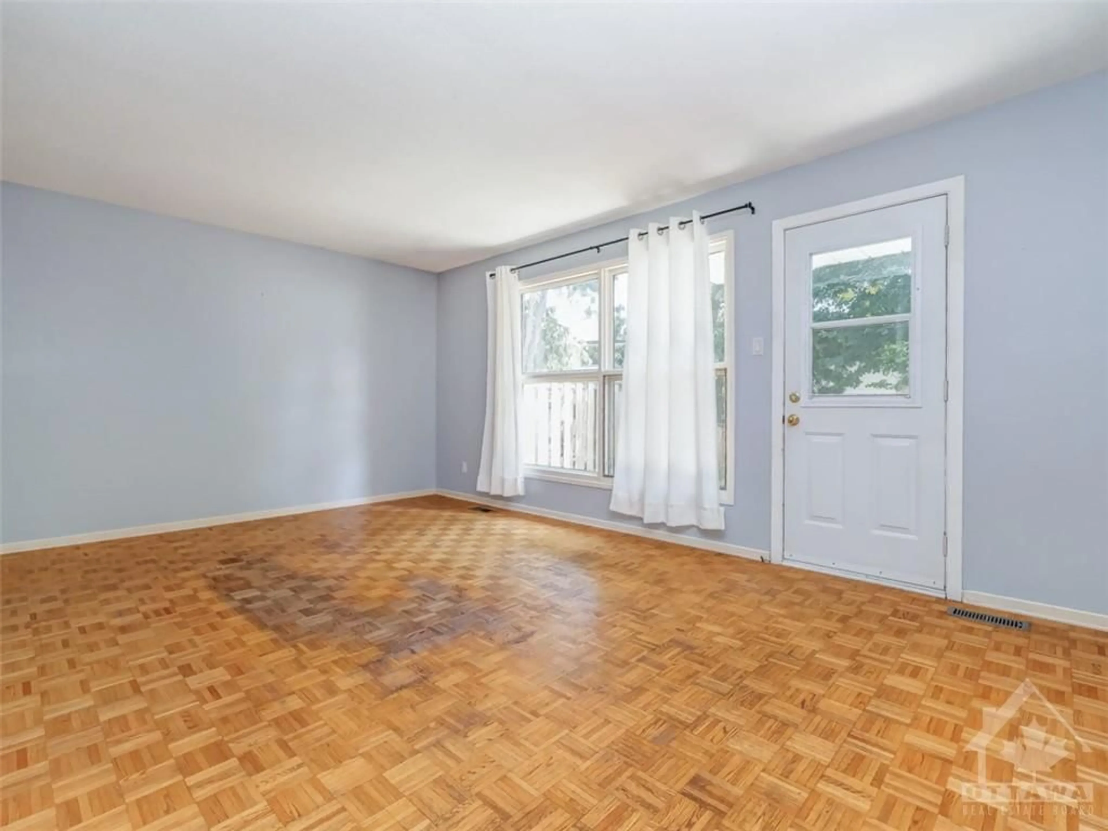 A pic of a room, wood floors for 33 CARMICHAEL Crt, Ottawa Ontario K2K 1K1