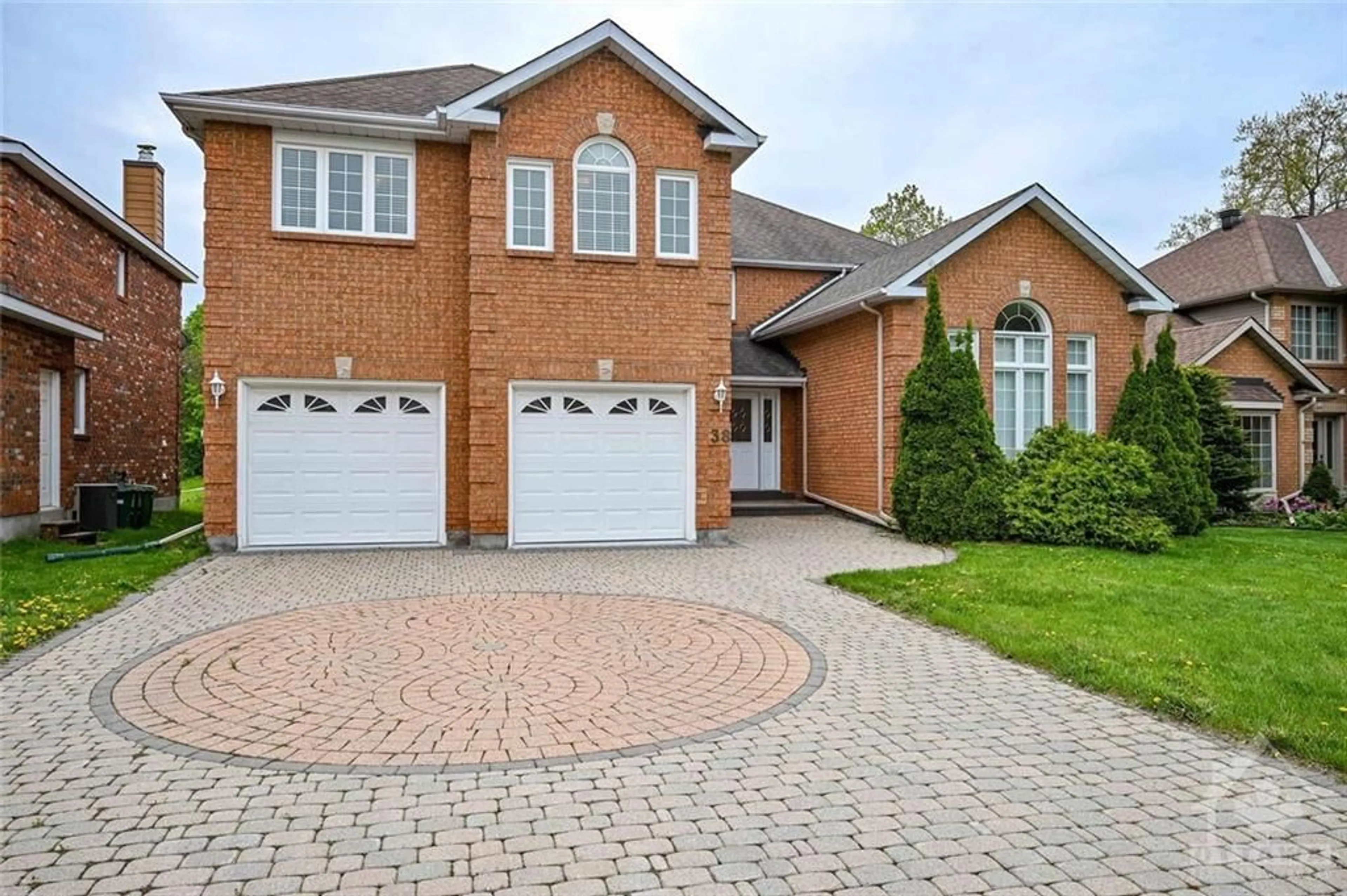 Home with brick exterior material for 38 KNUDSON Dr, Ottawa Ontario K2K 2L6