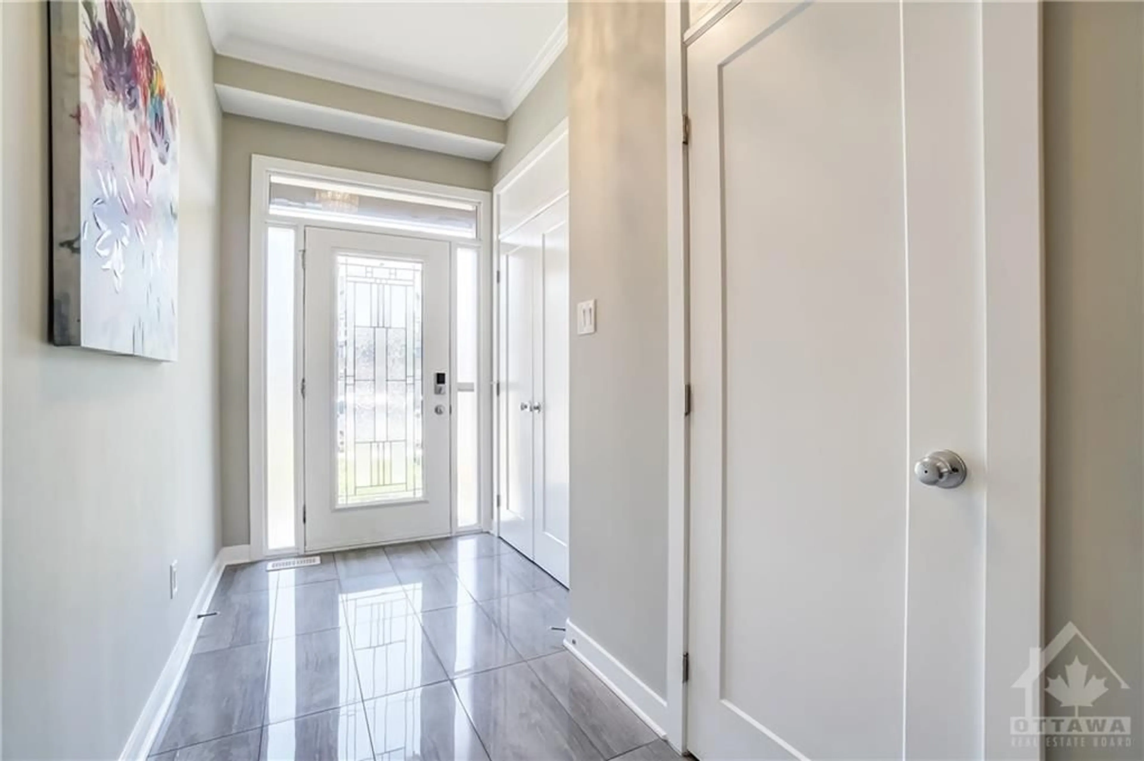 Indoor entryway, wood floors for 271 AVRO Cir, Ottawa Ontario K1K 3X7