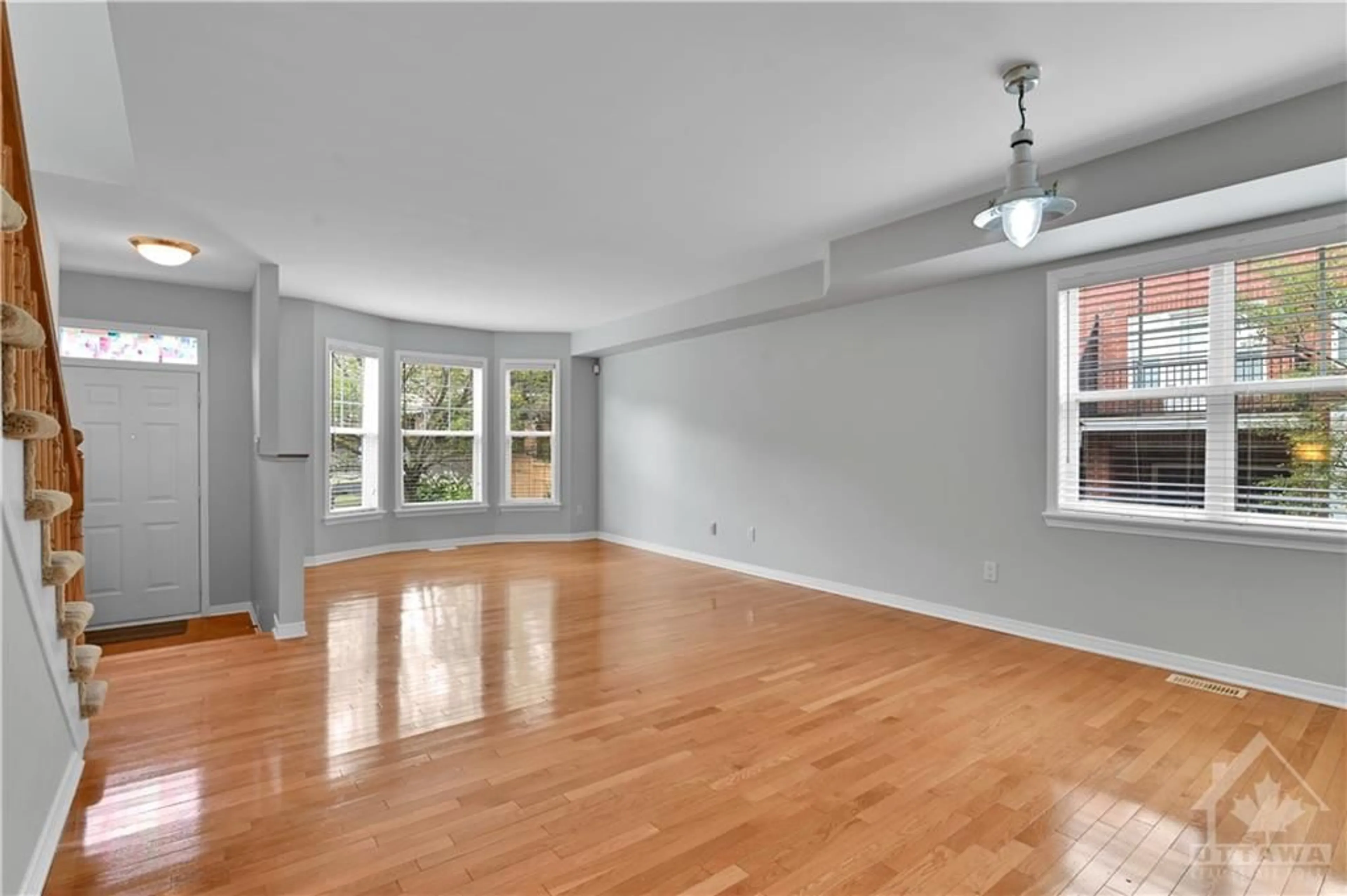 A pic of a room, wood floors for 62 JARDIN Pvt, Ottawa Ontario K1K 4V9