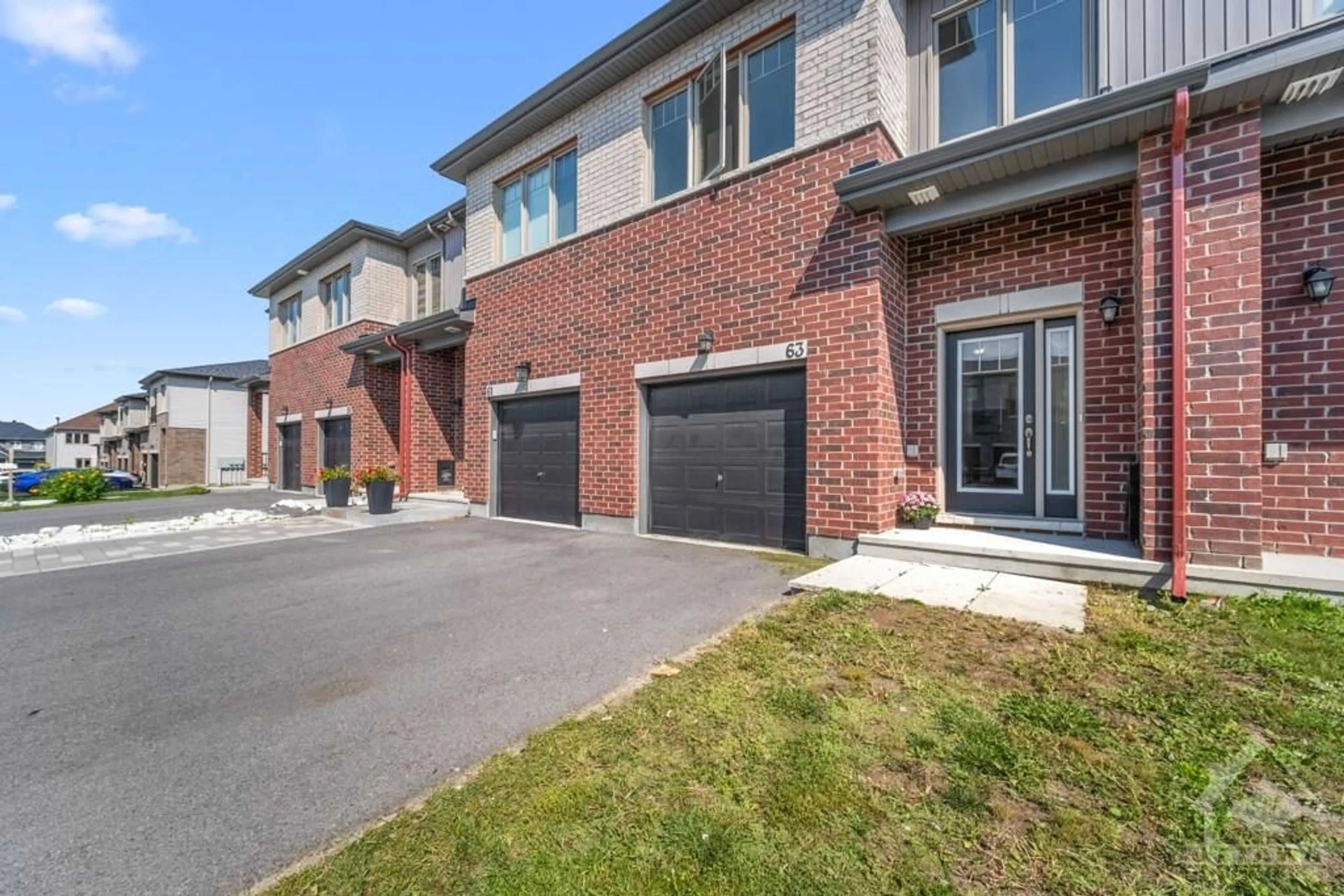 Home with brick exterior material for 63 RALLIDALE St, Ottawa Ontario K1X 1G6