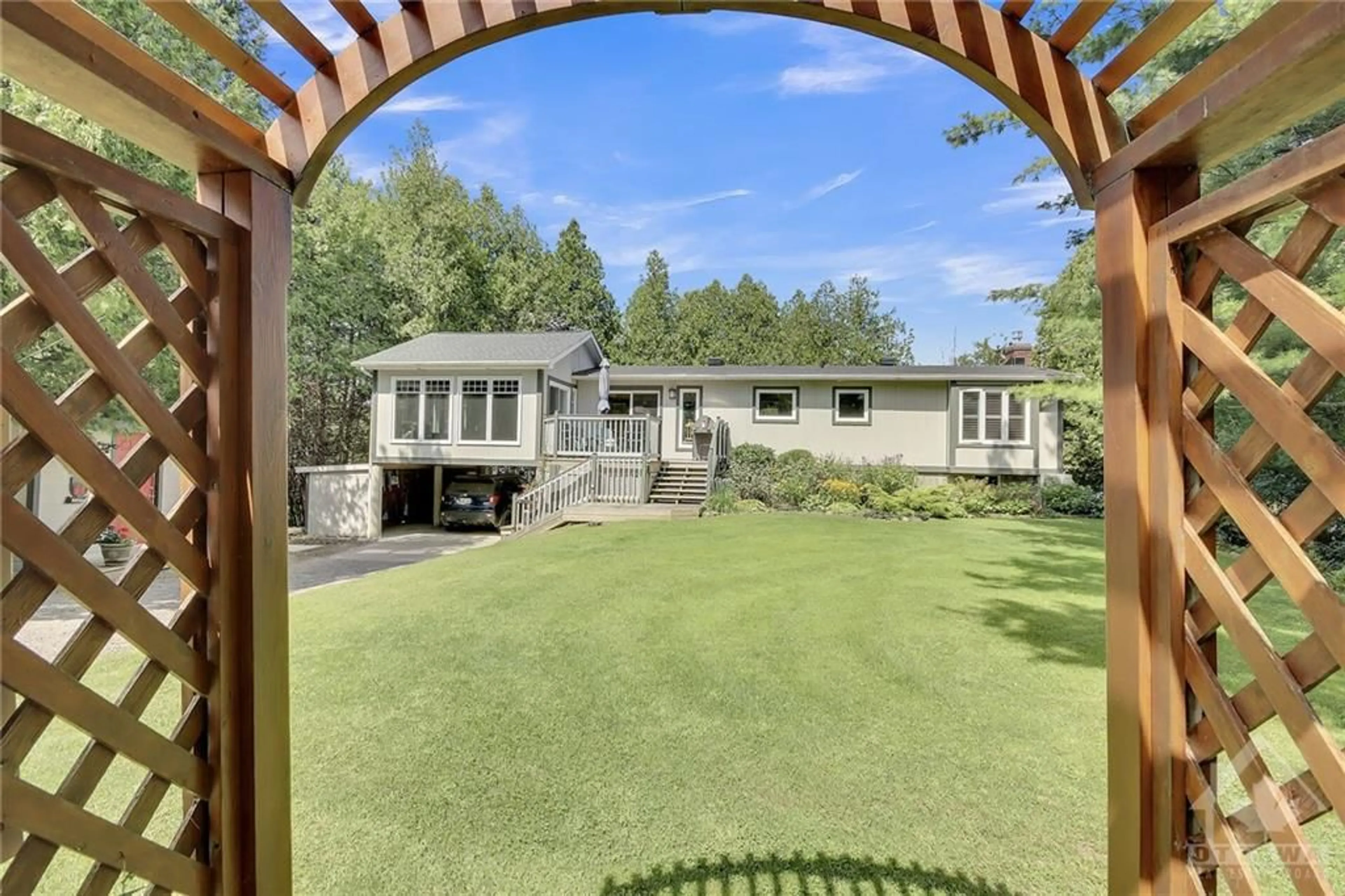 Frontside or backside of a home, the fenced backyard for 4537 KINGFISH BAY Rd, Portland Ontario K0G 1V0