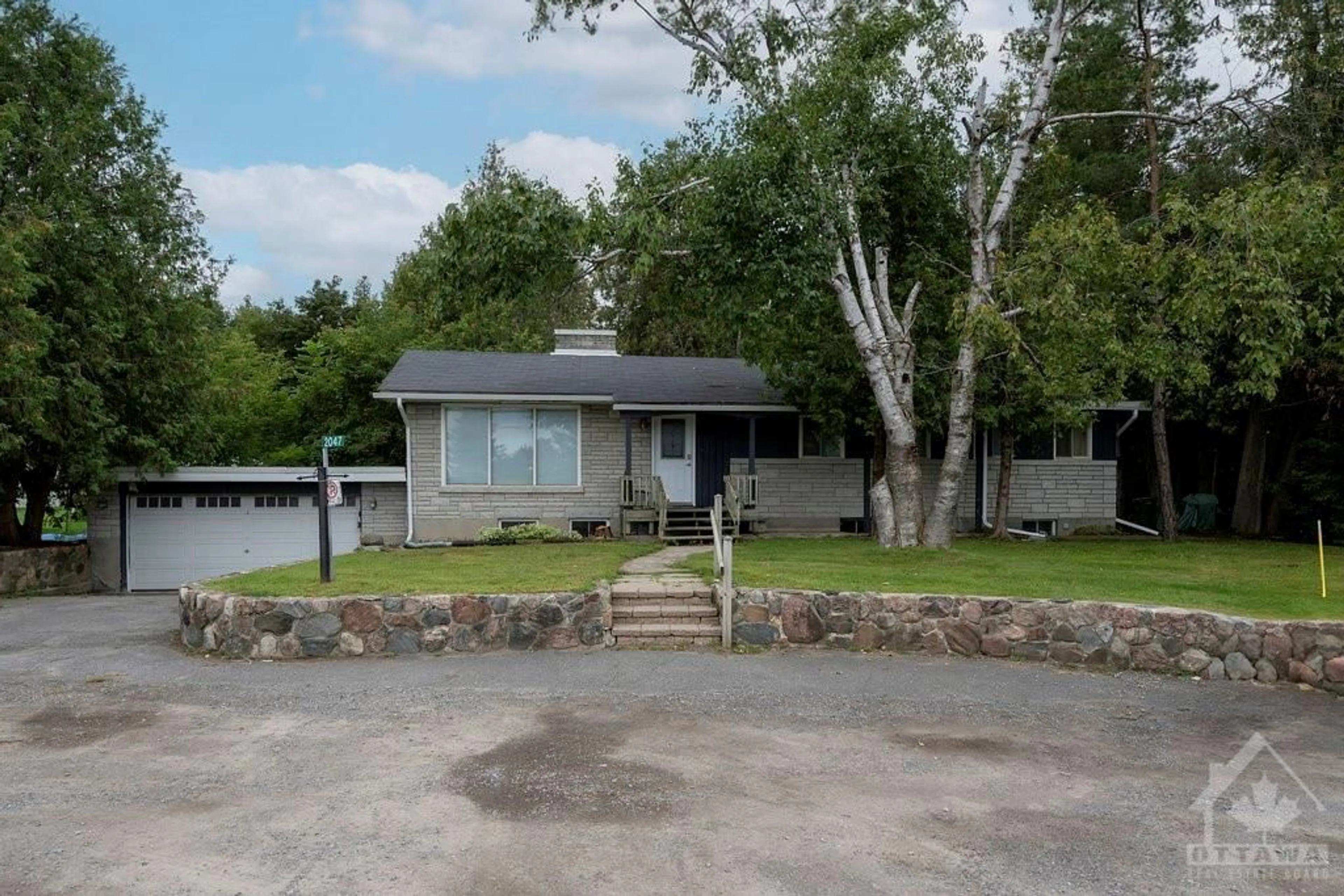 Frontside or backside of a home, cottage for 2047 CARP Rd, Stittsville Ontario K0A 1L0