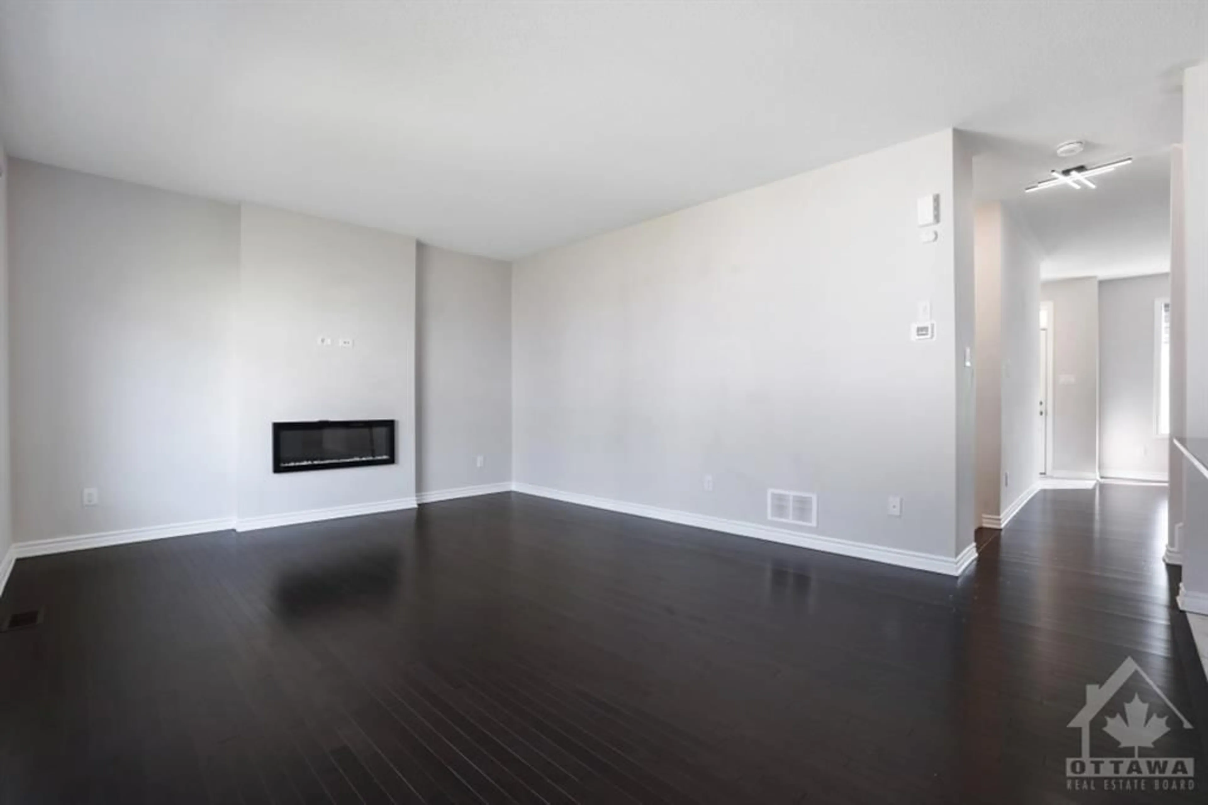 Living room, wood floors for 513 STURNIDAE St, Ottawa Ontario K2J 6X1