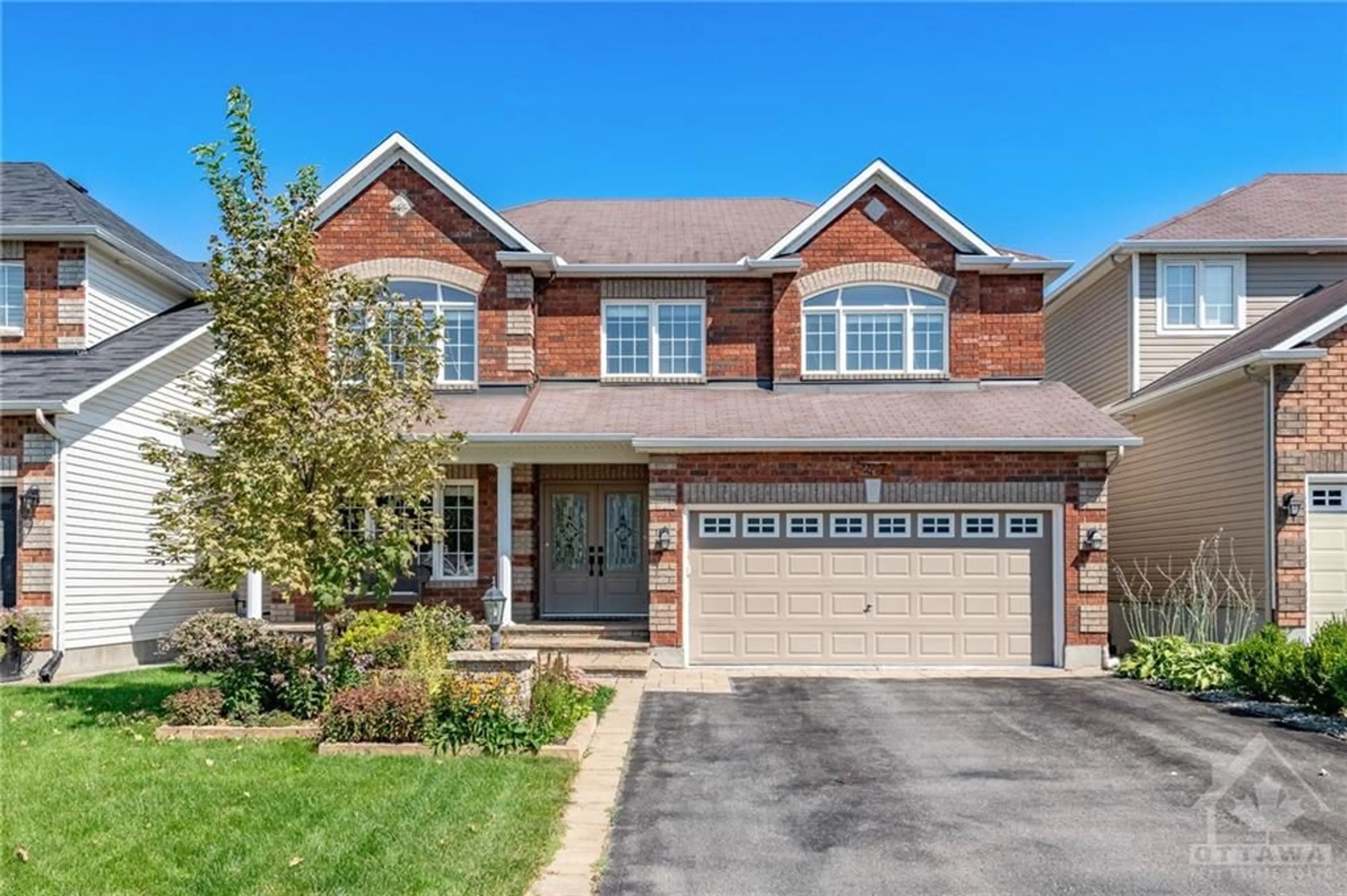 Home with brick exterior material for 247 LUCINDA Cres, Ottawa Ontario K1W 0A3