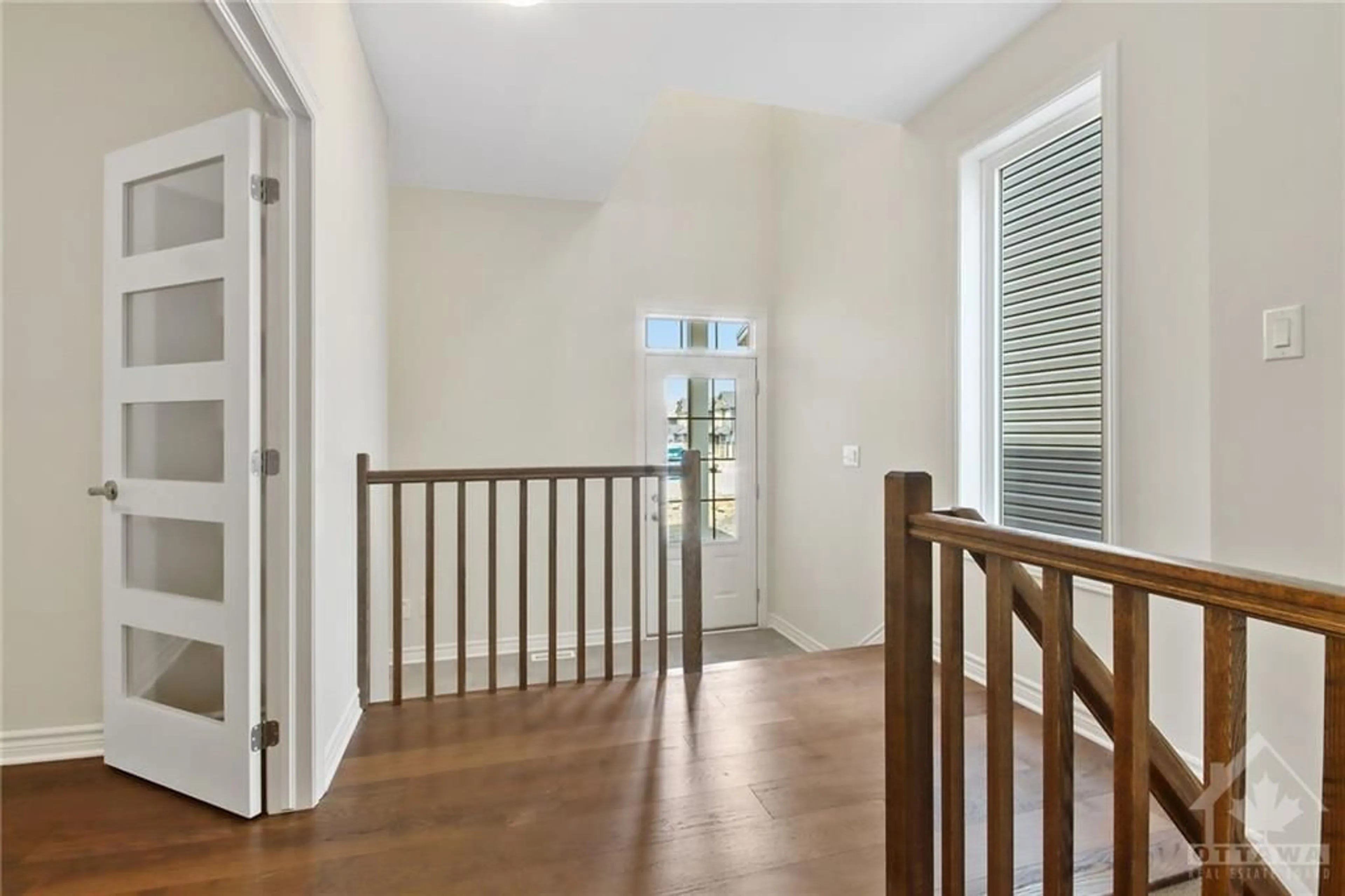 Indoor foyer, wood floors for 517 PAAKANAAK Ave, Ottawa Ontario K1X 0G9