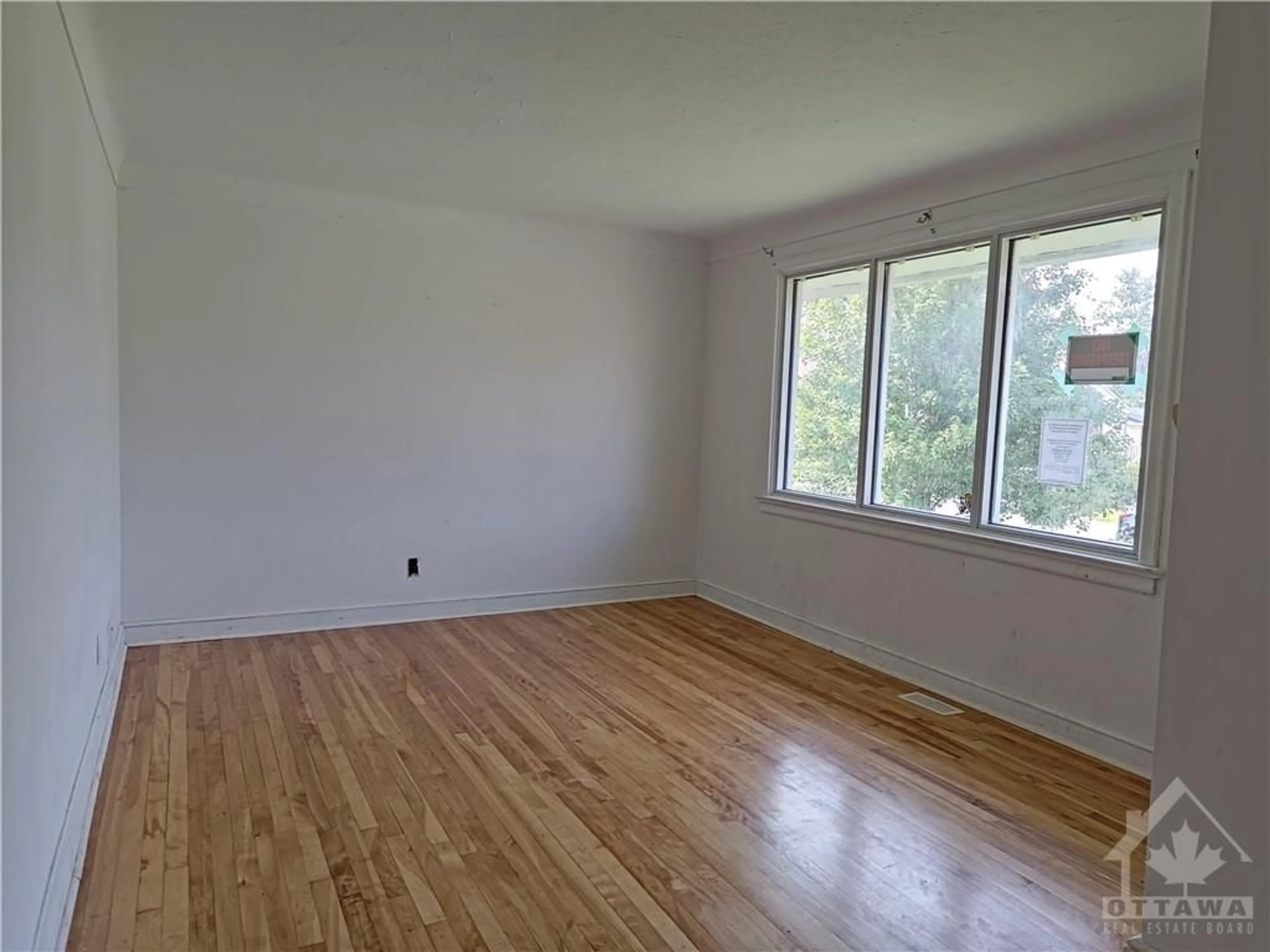 A pic of a room, wood floors for 2647 AYERS Ave, Ottawa Ontario K1V 7W7