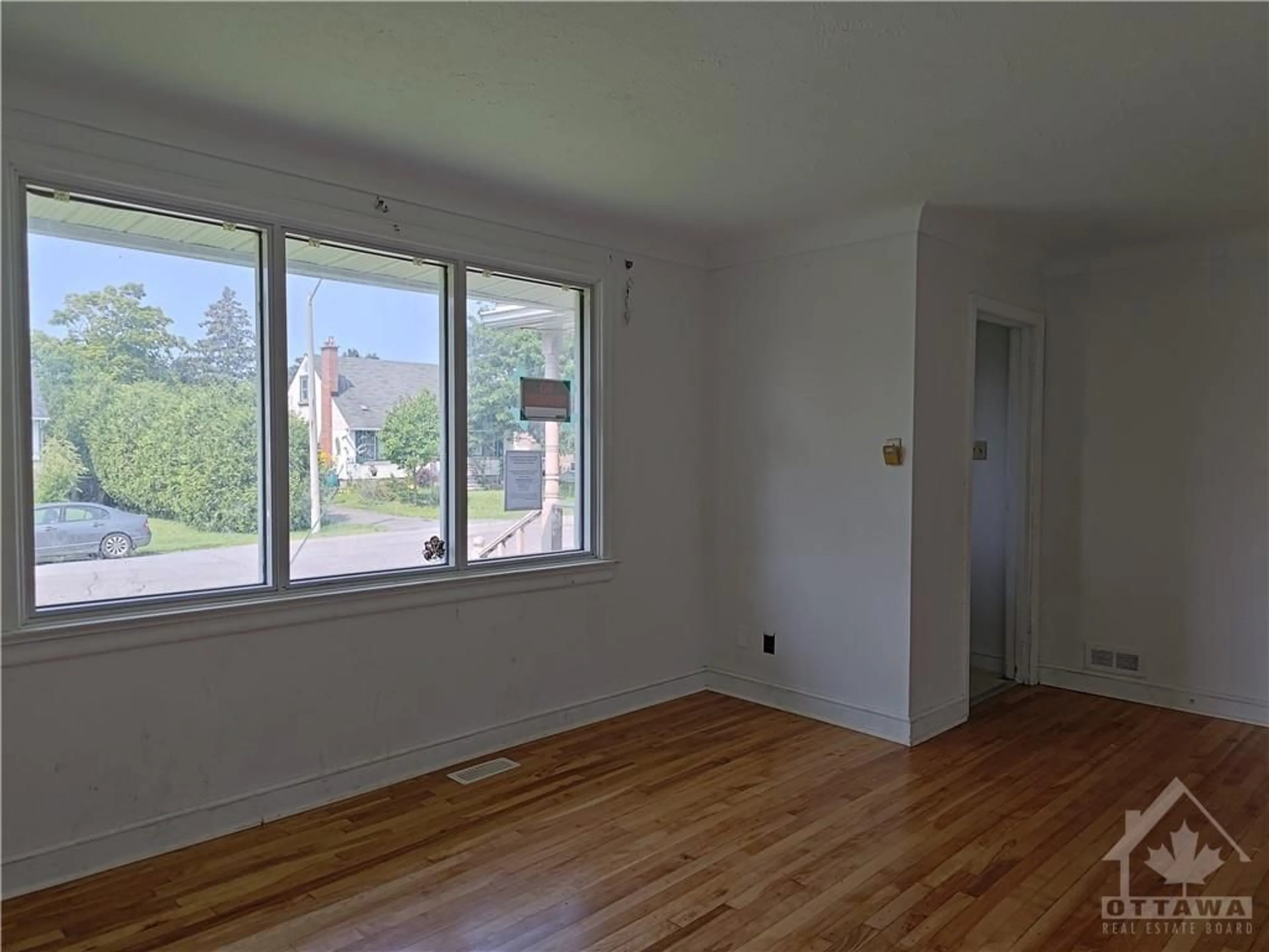 A pic of a room, wood floors for 2647 AYERS Ave, Ottawa Ontario K1V 7W7