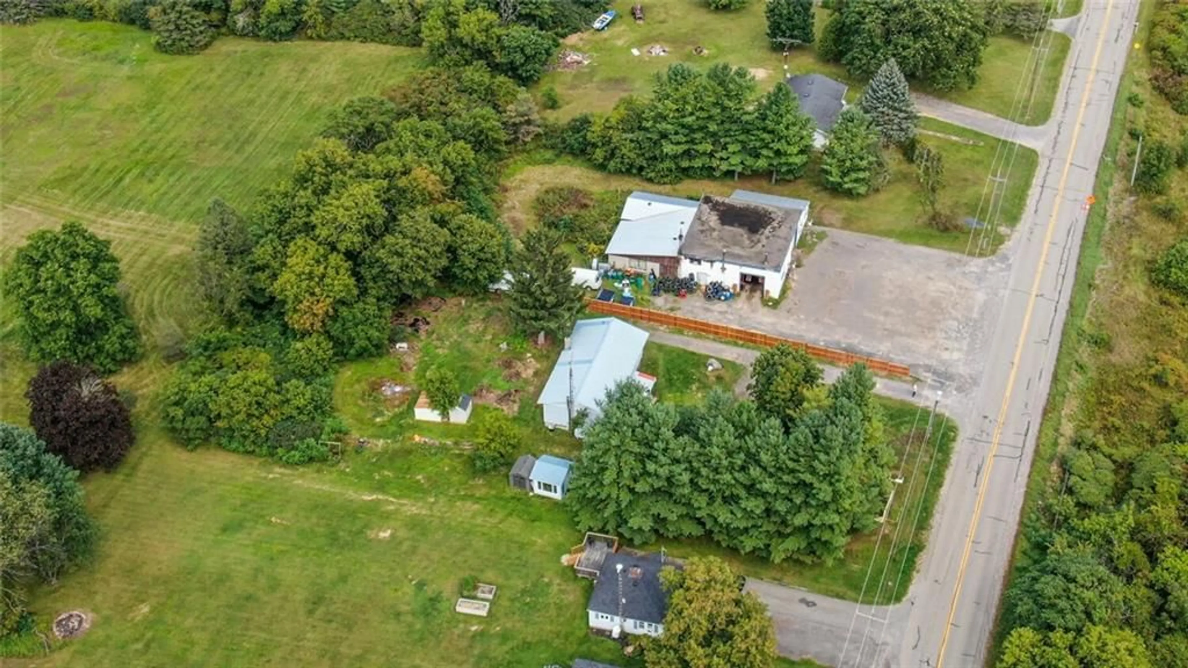 A pic from exterior of the house or condo, the fenced backyard for 2670 MCINTOSH Rd, Prescott Ontario K0E 1T0