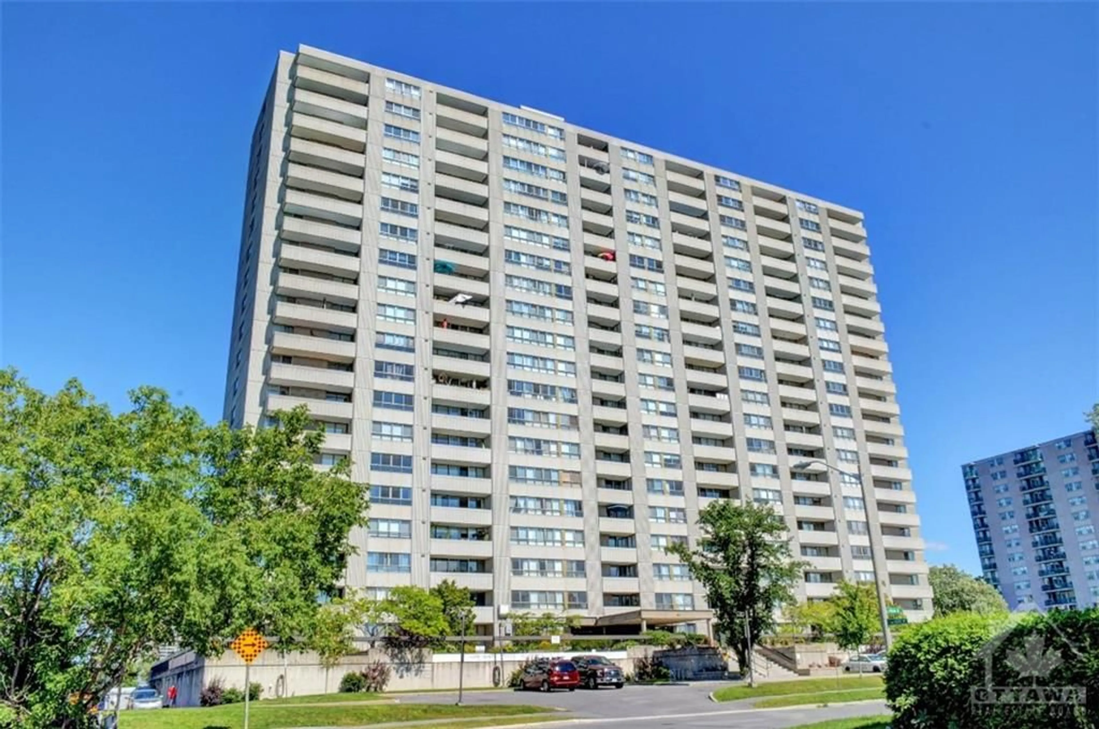 A pic from exterior of the house or condo, the front or back of building for 265 POULIN Ave #211, Ottawa Ontario K2B 7Y8