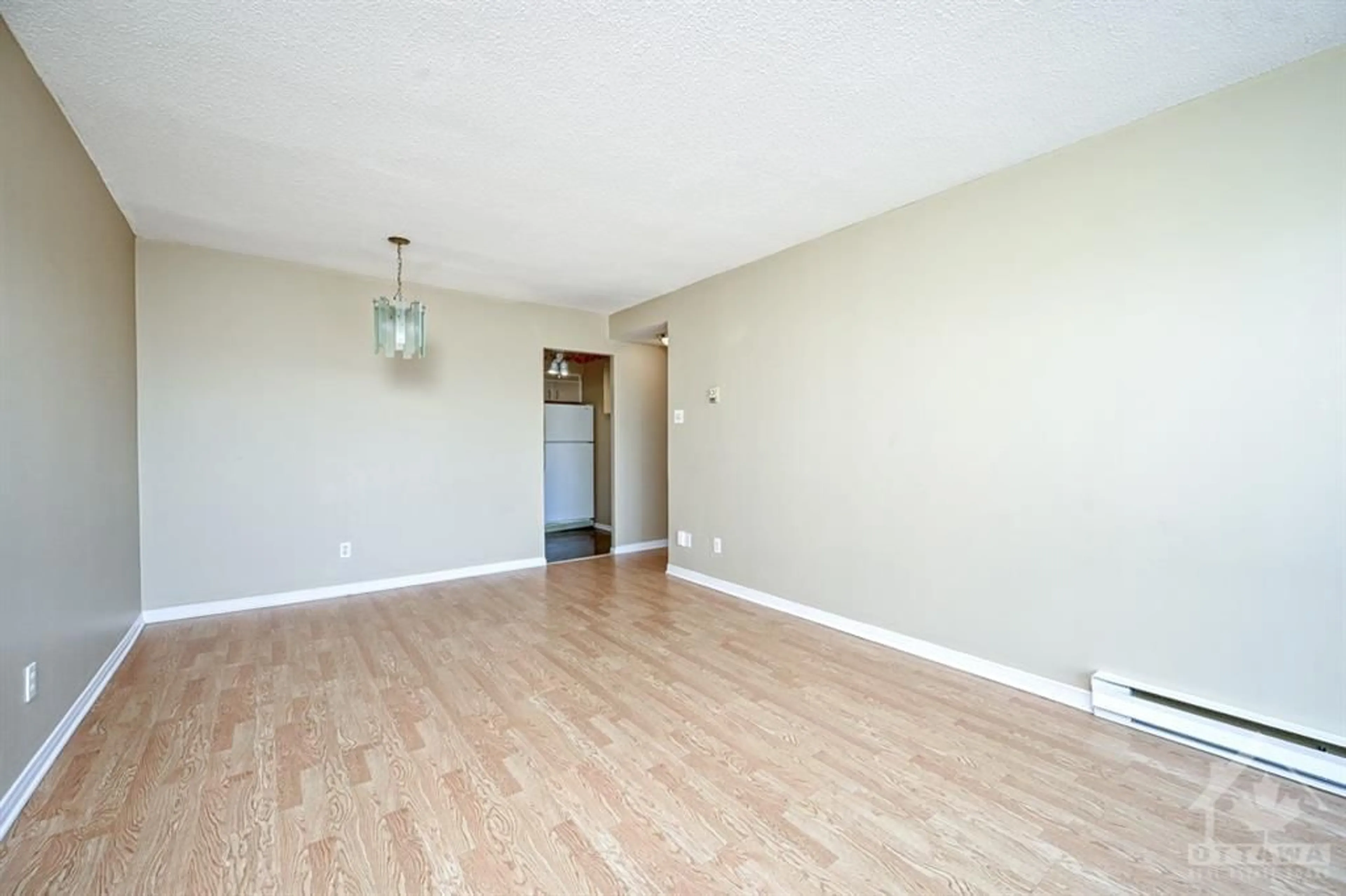 A pic of a room, wood floors for 158C MCARTHUR Ave #903, Ottawa Ontario K1L 8E7