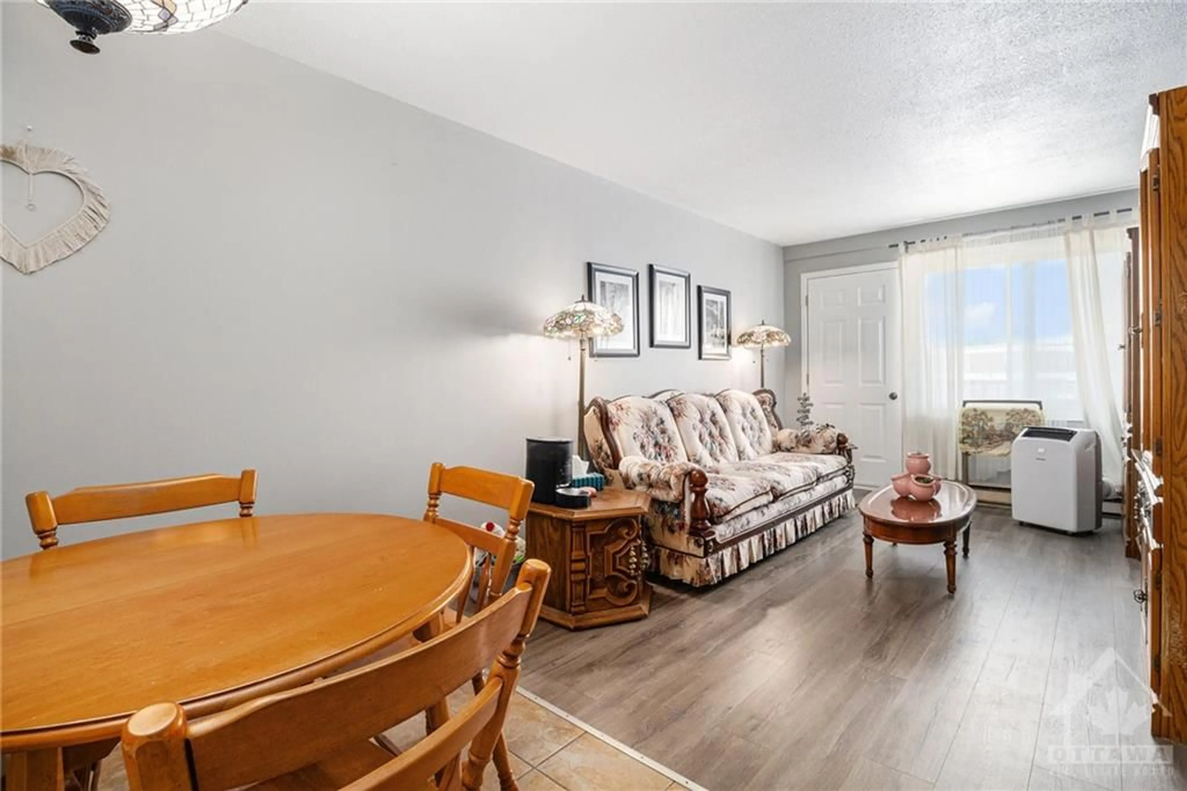 Living room, wood floors for 2041 ARROWSMITH Dr #301B, Ottawa Ontario K1J 7V7