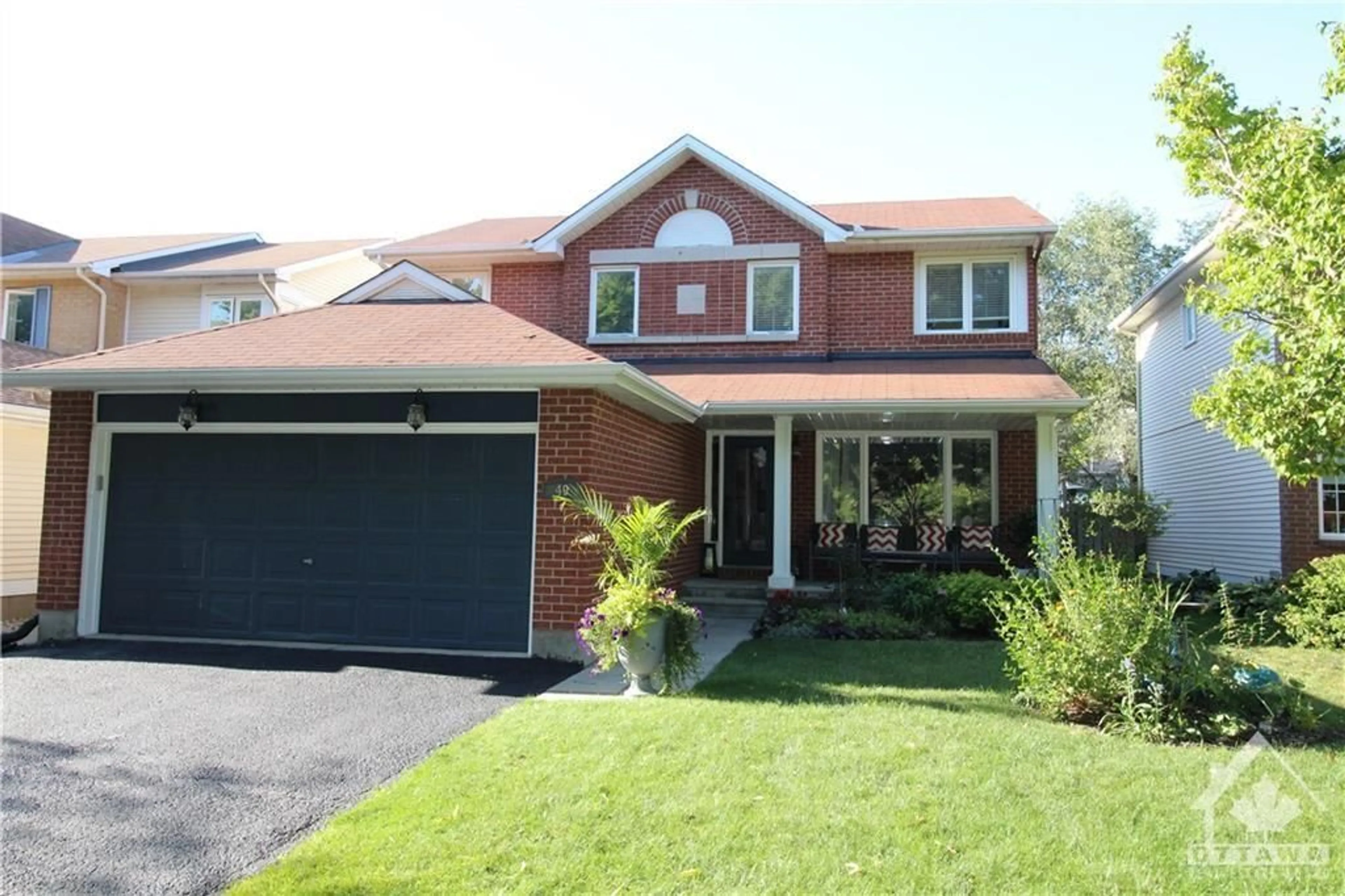 Home with brick exterior material for 49 EMERALD MEADOWS Dr, Ottawa Ontario K2M 2L5