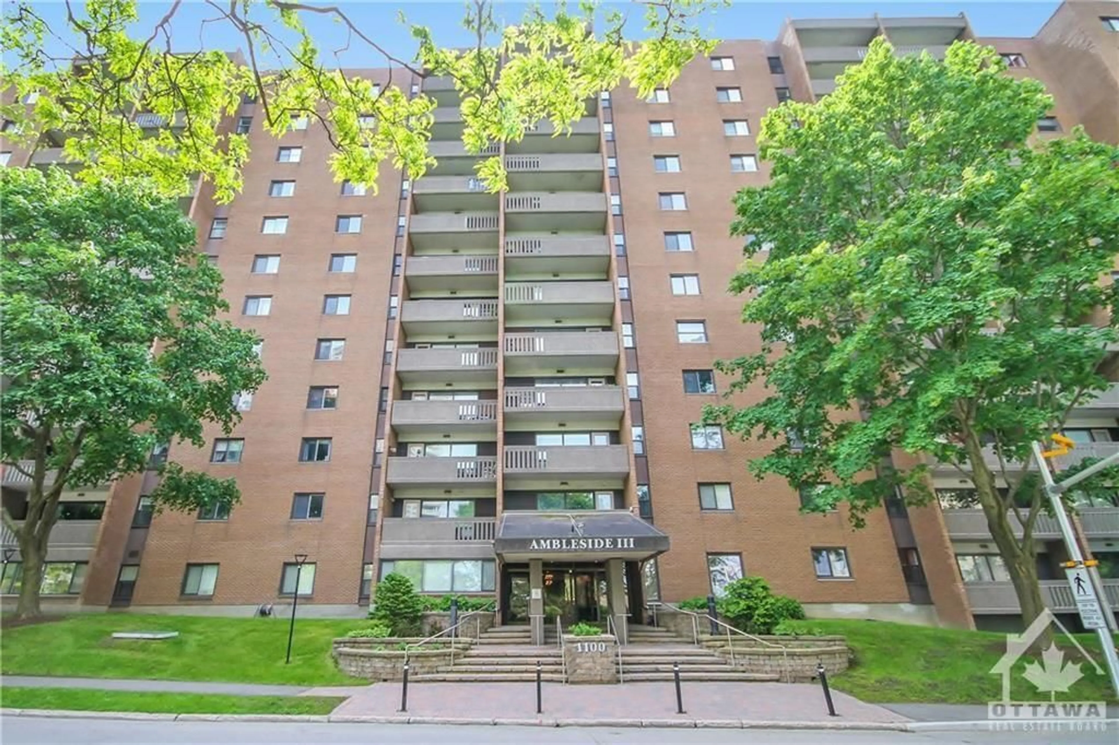 A pic from exterior of the house or condo, the front or back of building for 1100 AMBLESIDE Dr #216, Ottawa Ontario K2B 8G6