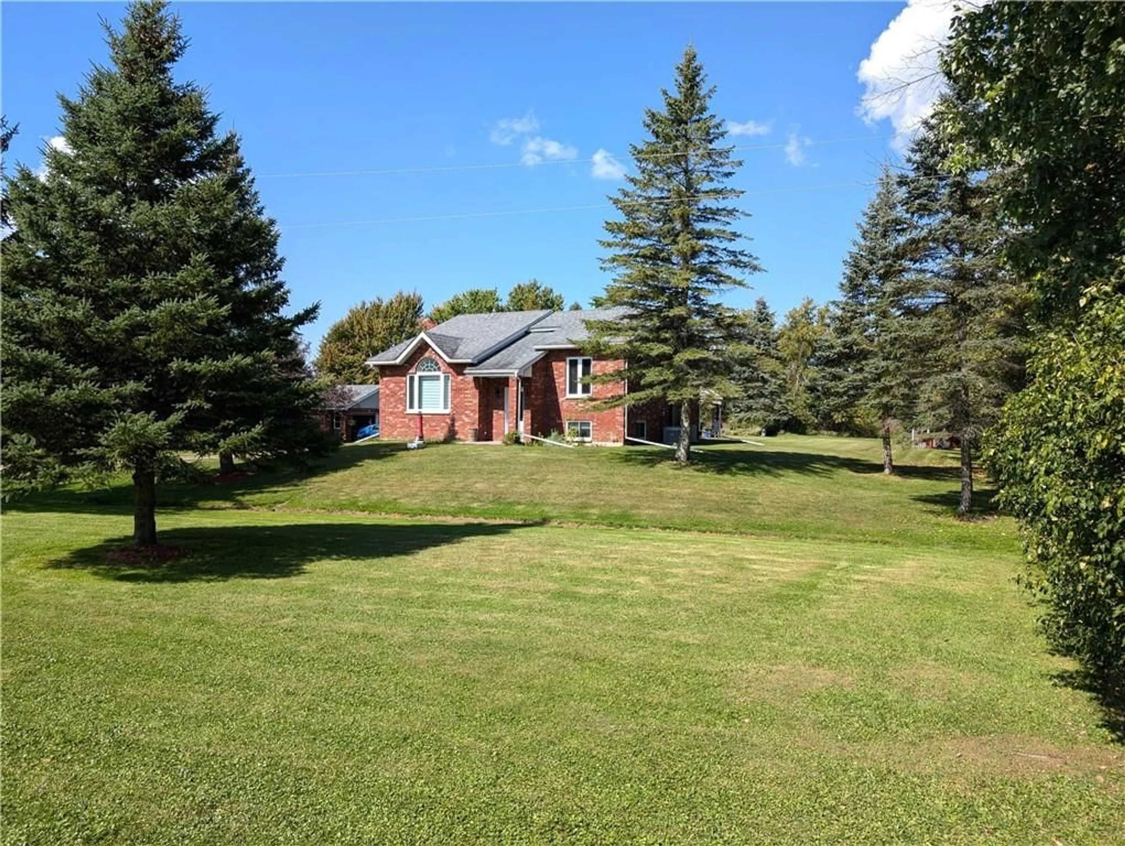 Frontside or backside of a home, the fenced backyard for 17307 WHEELER Rd, St Andrews West Ontario K0C 2A0