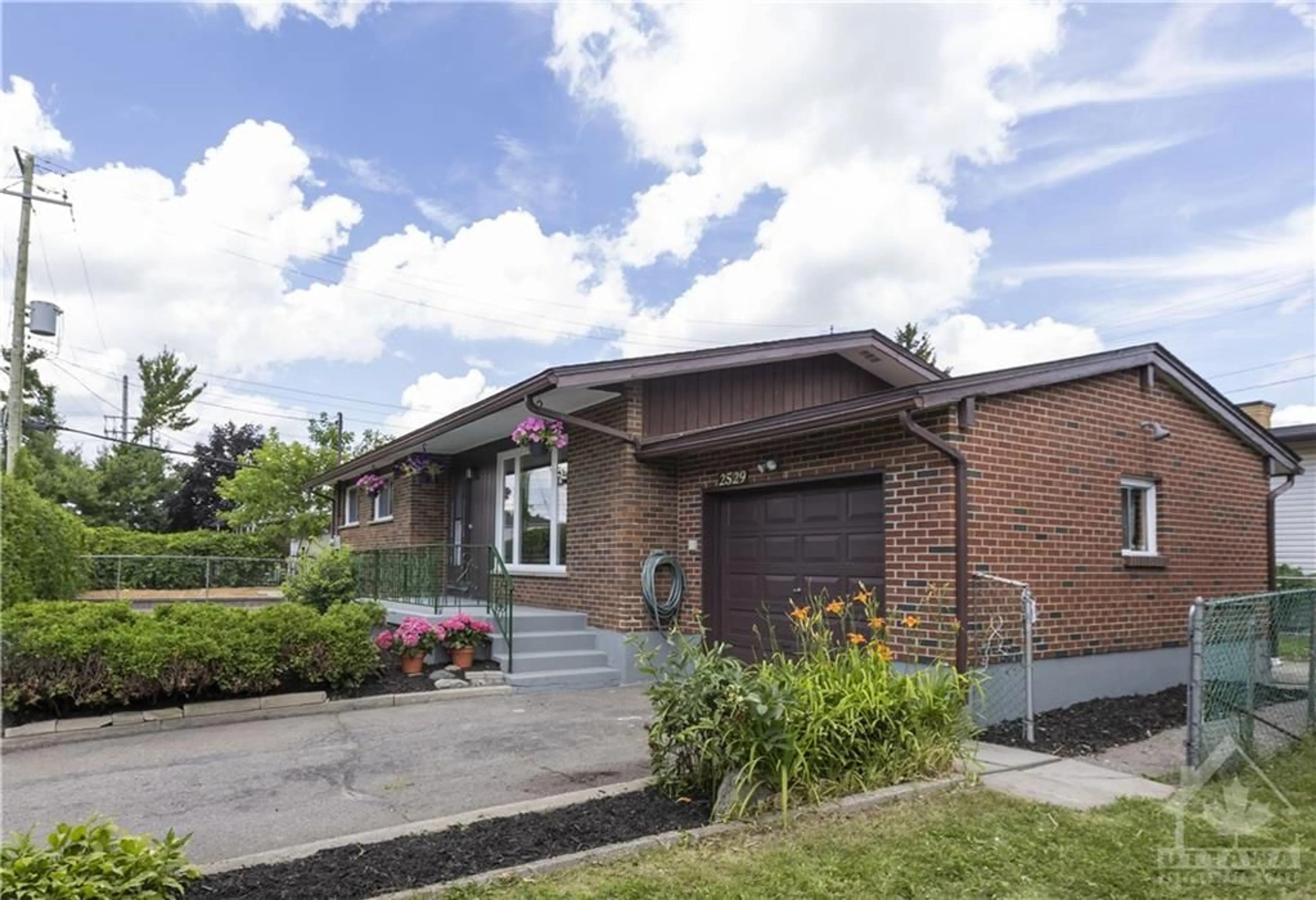 Home with brick exterior material for 2529 KALADAR Ave, Ottawa Ontario K1V 8C3