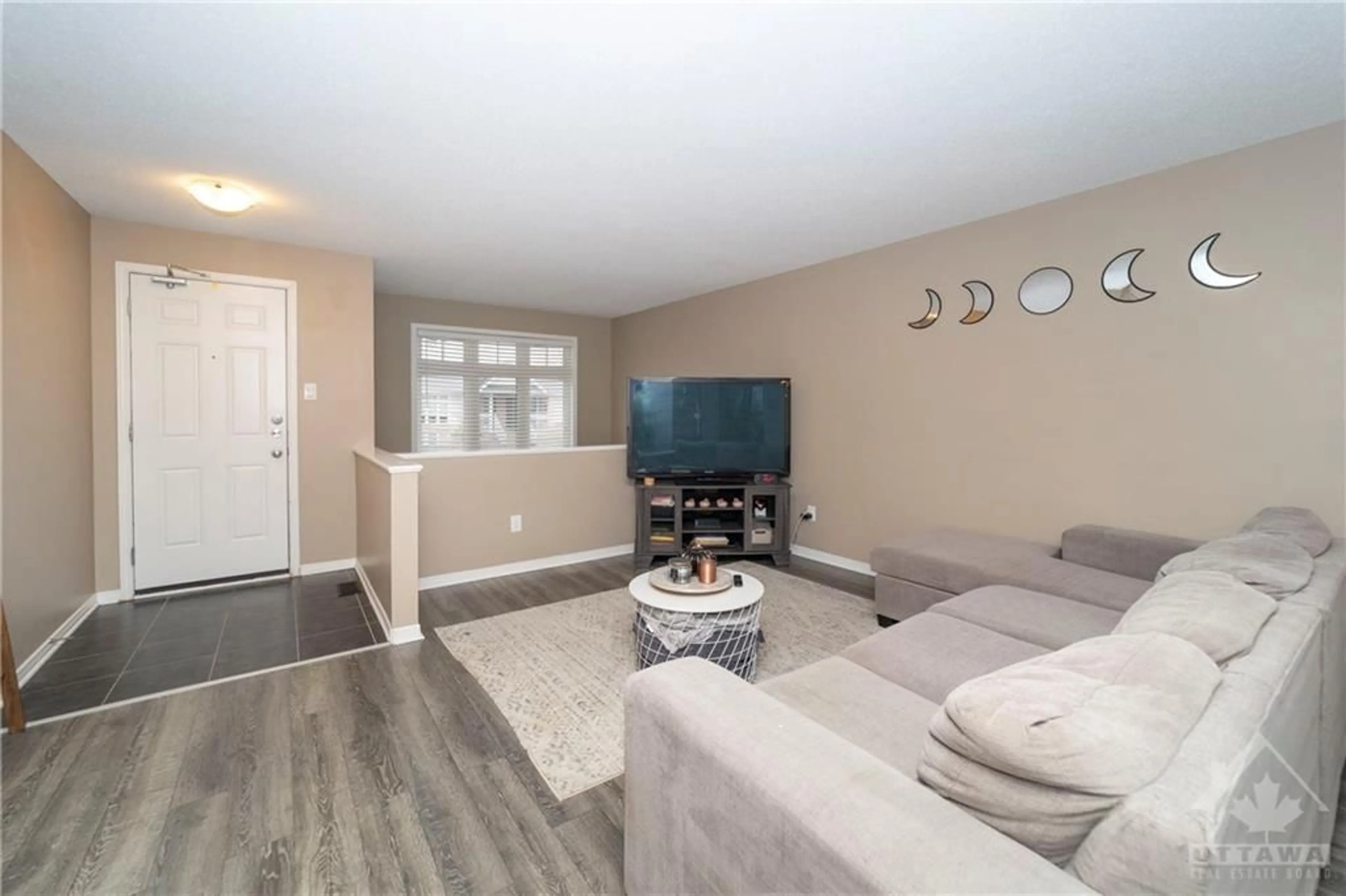 Living room, wood floors for 309 GALSTON Pvt, Orleans Ontario K1W 0G3