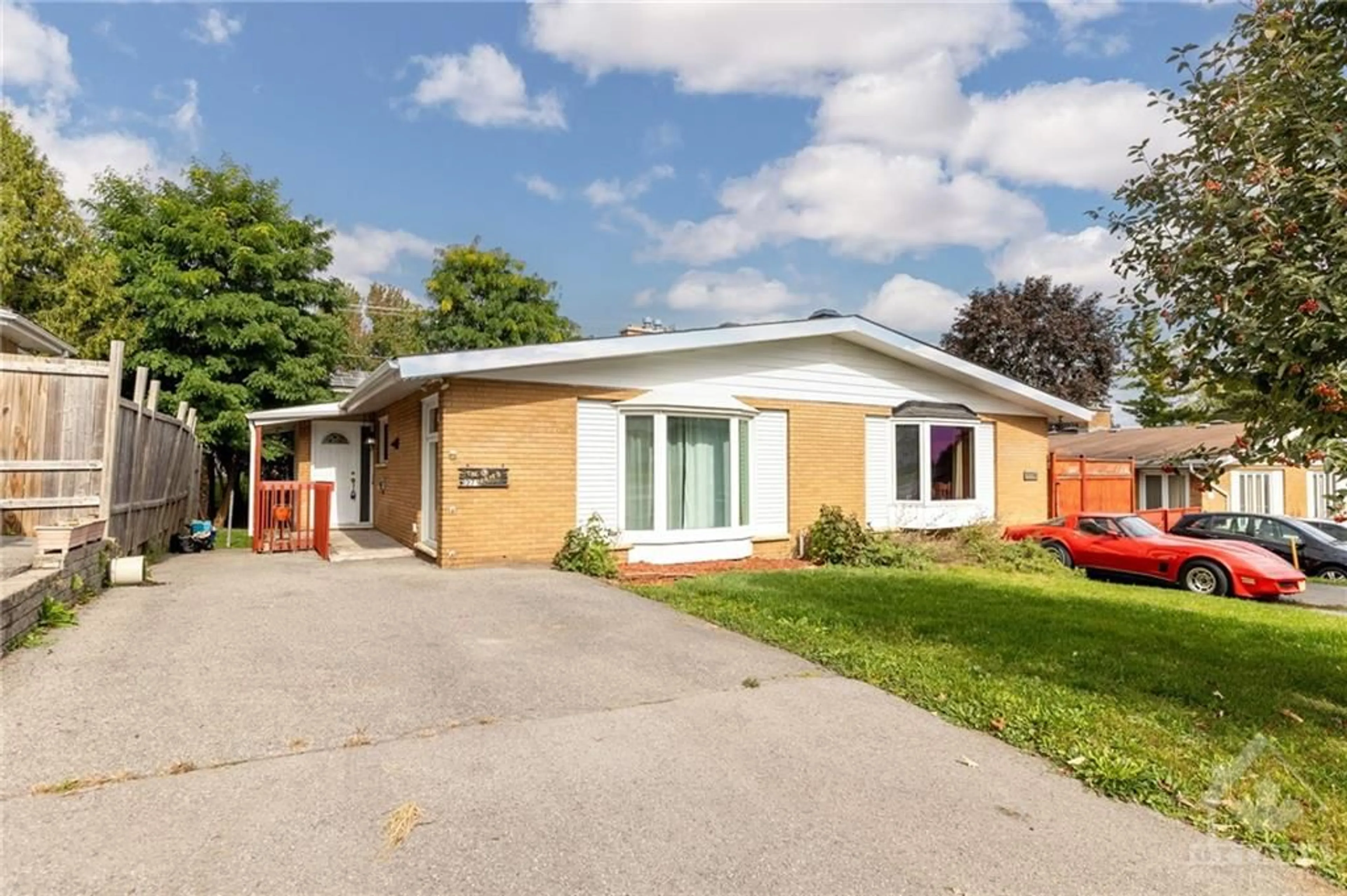 Frontside or backside of a home, the street view for 1271 MEADOWLANDS Dr, Ottawa Ontario K2E 6K4