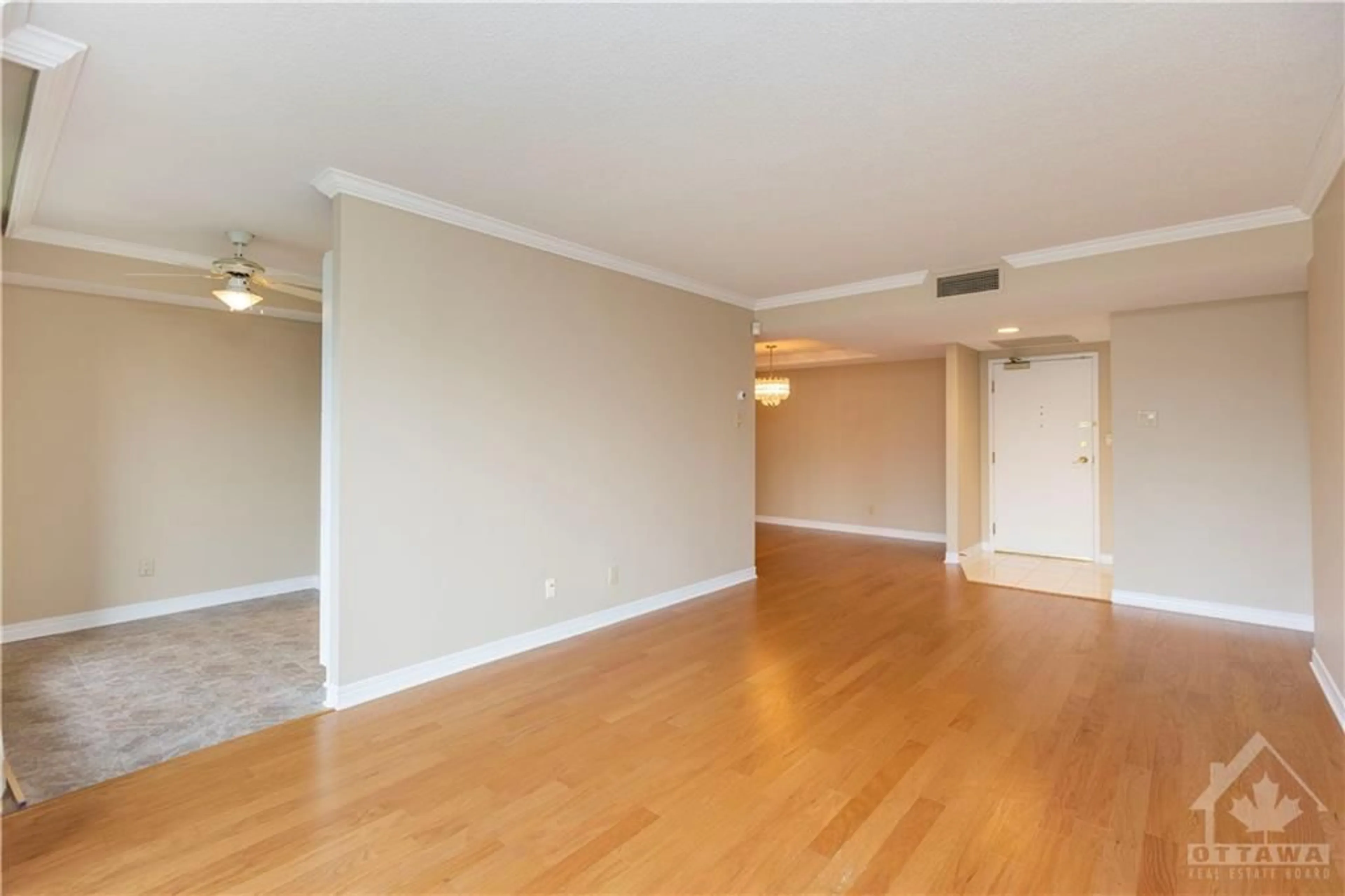 A pic of a room, wood floors for 100 GRANT CARMAN Dr #116, Ottawa Ontario K2E 8B8