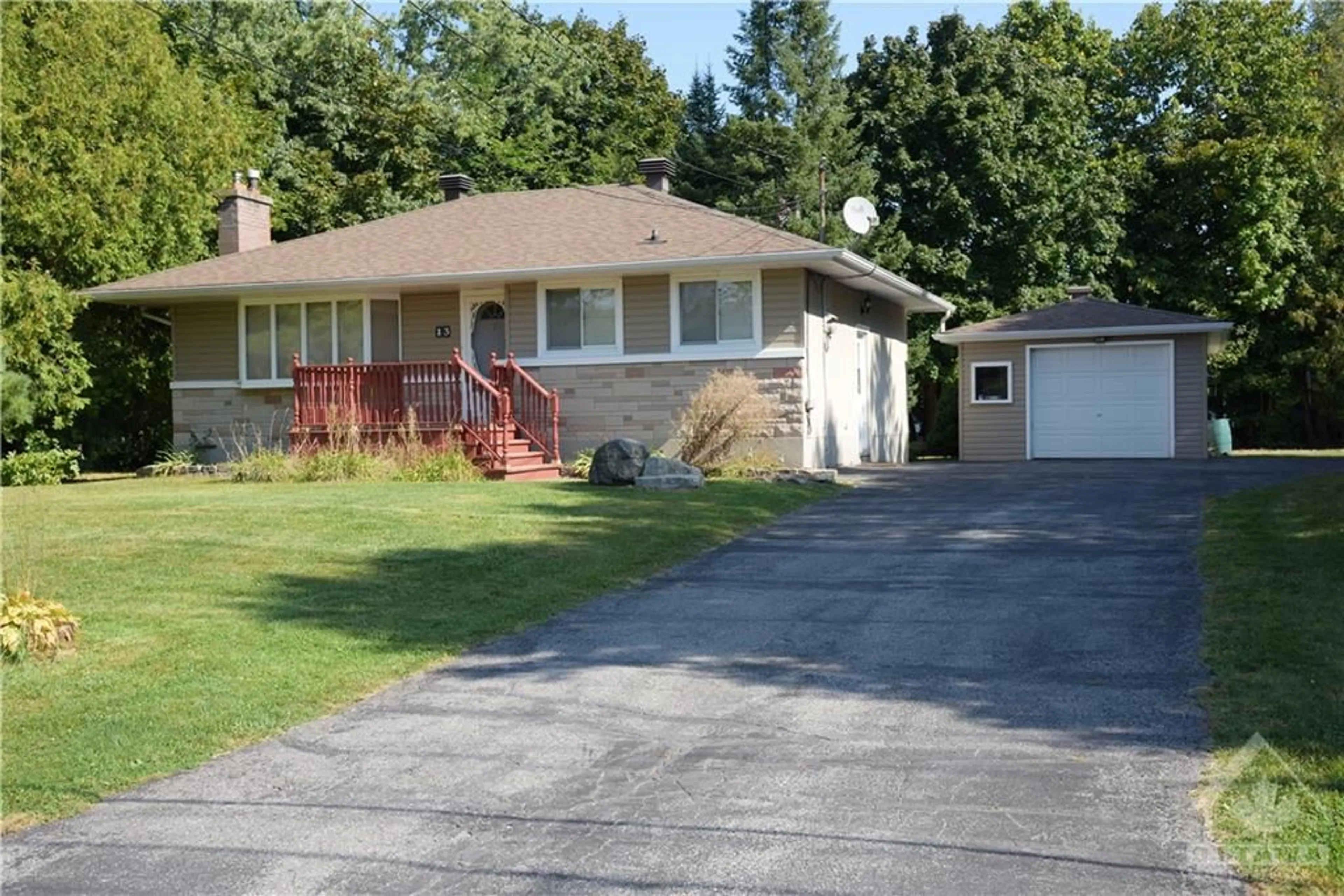 Frontside or backside of a home, cottage for 13 BRADLEY St, Stittsville Ontario K2S 1M9